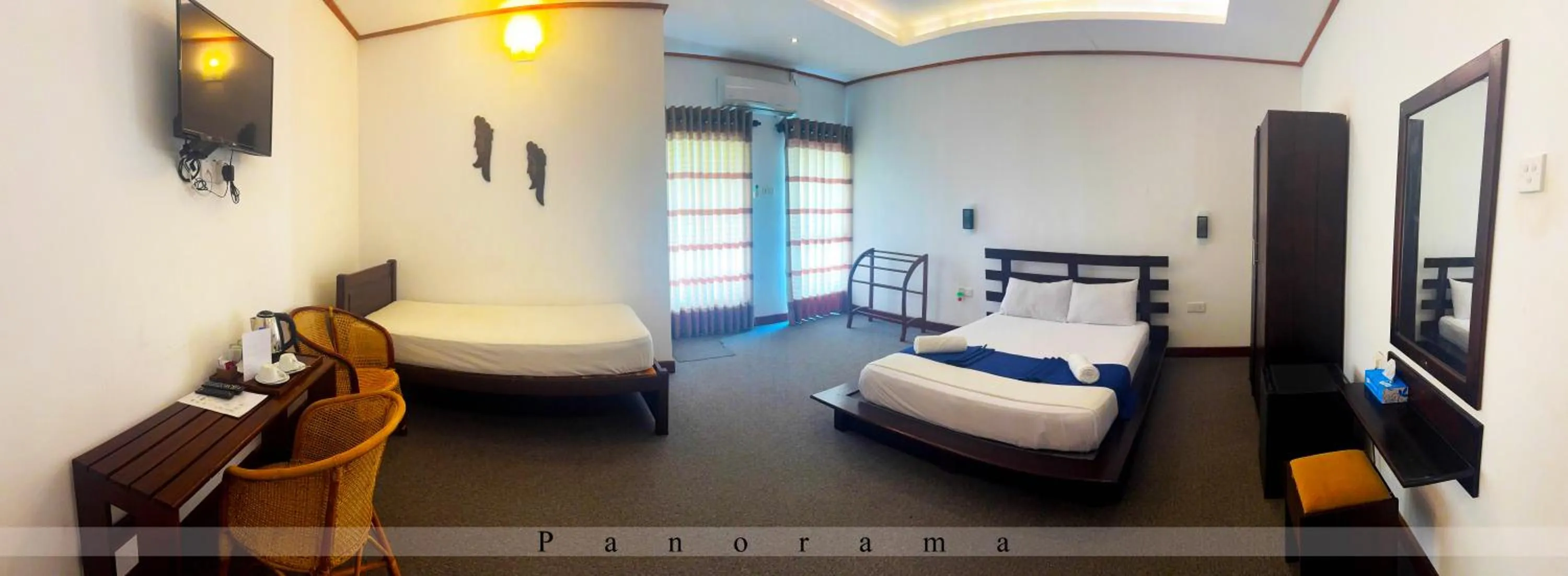 Bed in Nico Lagoon Hotel