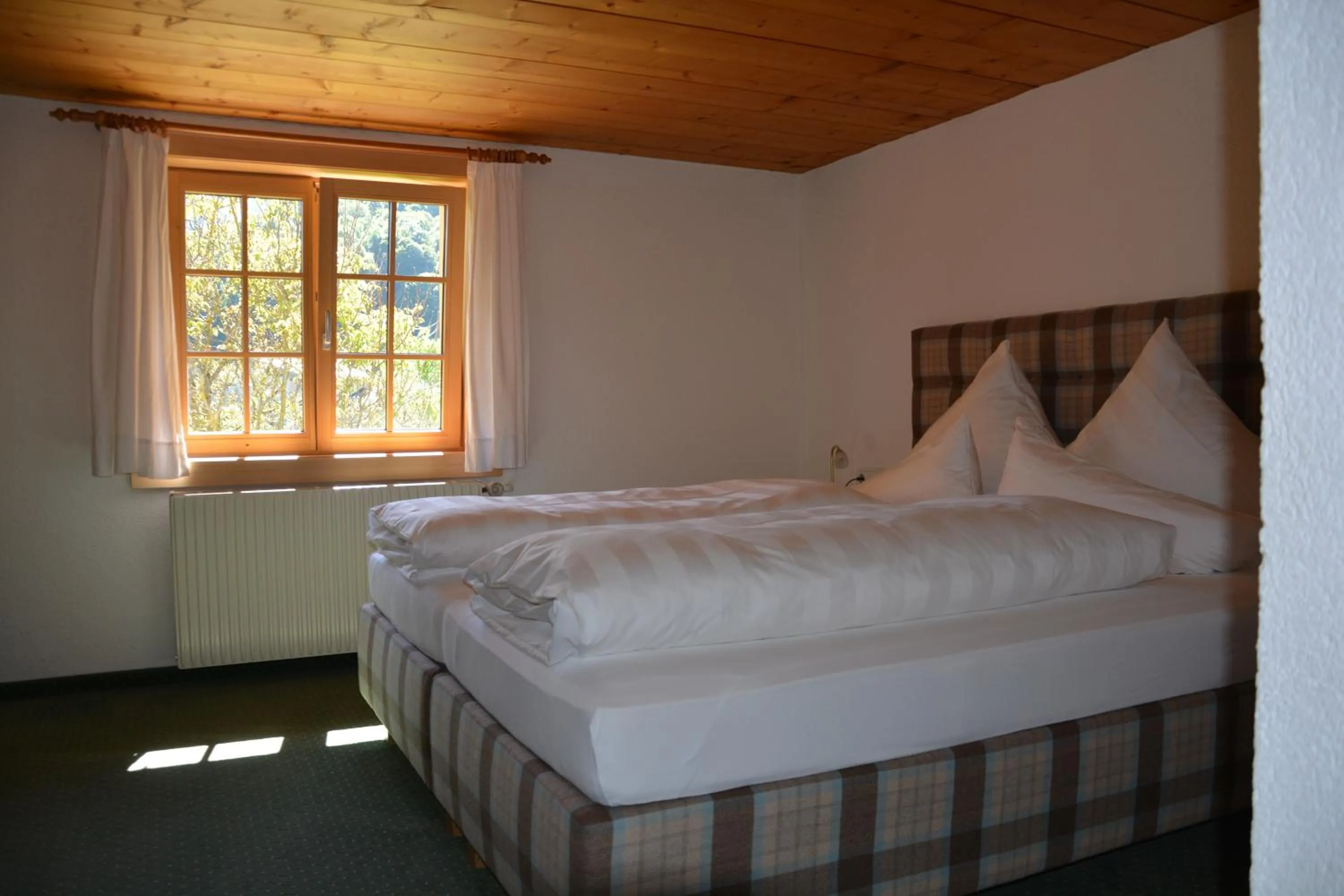 Bed in Hotel Tannahof