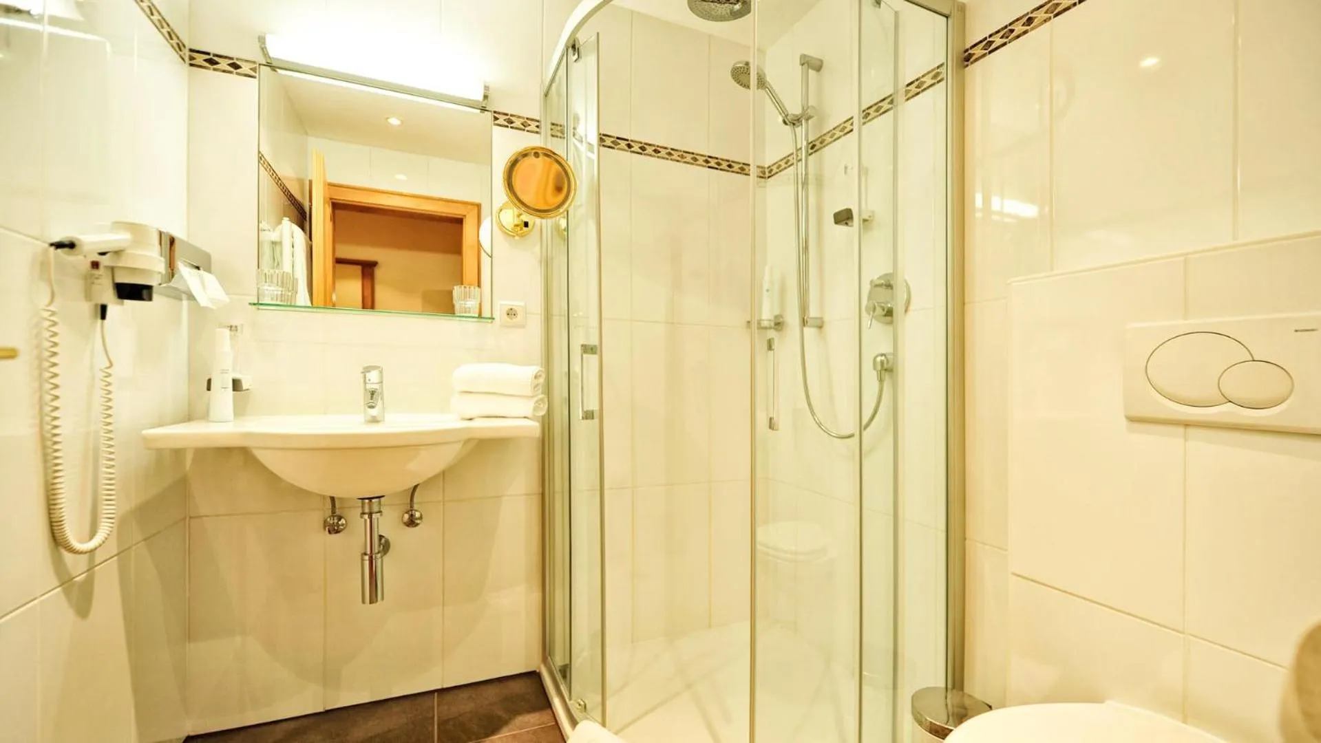 Bathroom in Hotel Königsblick by keyone