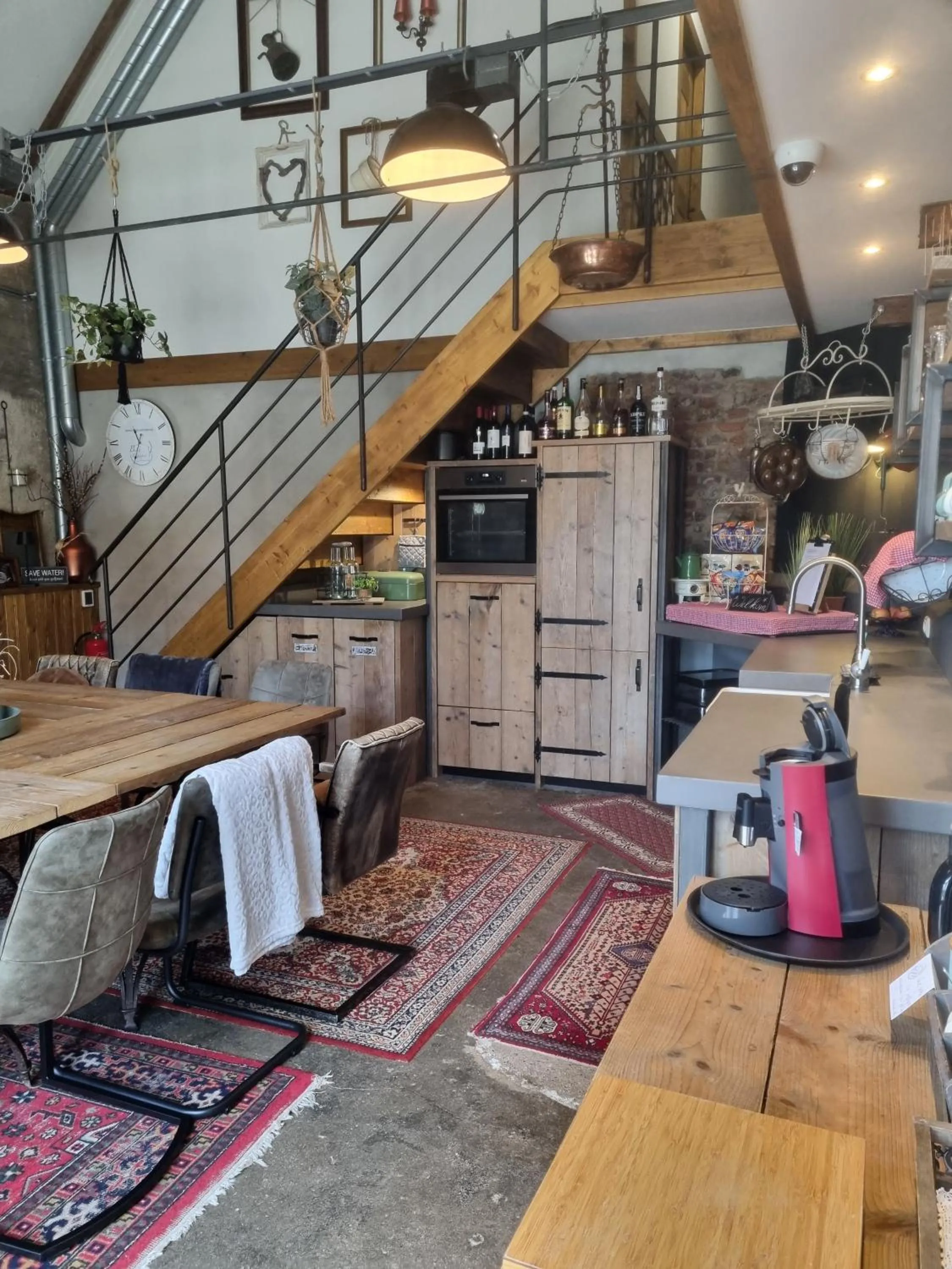 Communal lounge/ TV room in Bed & Breakfast aan de Beek