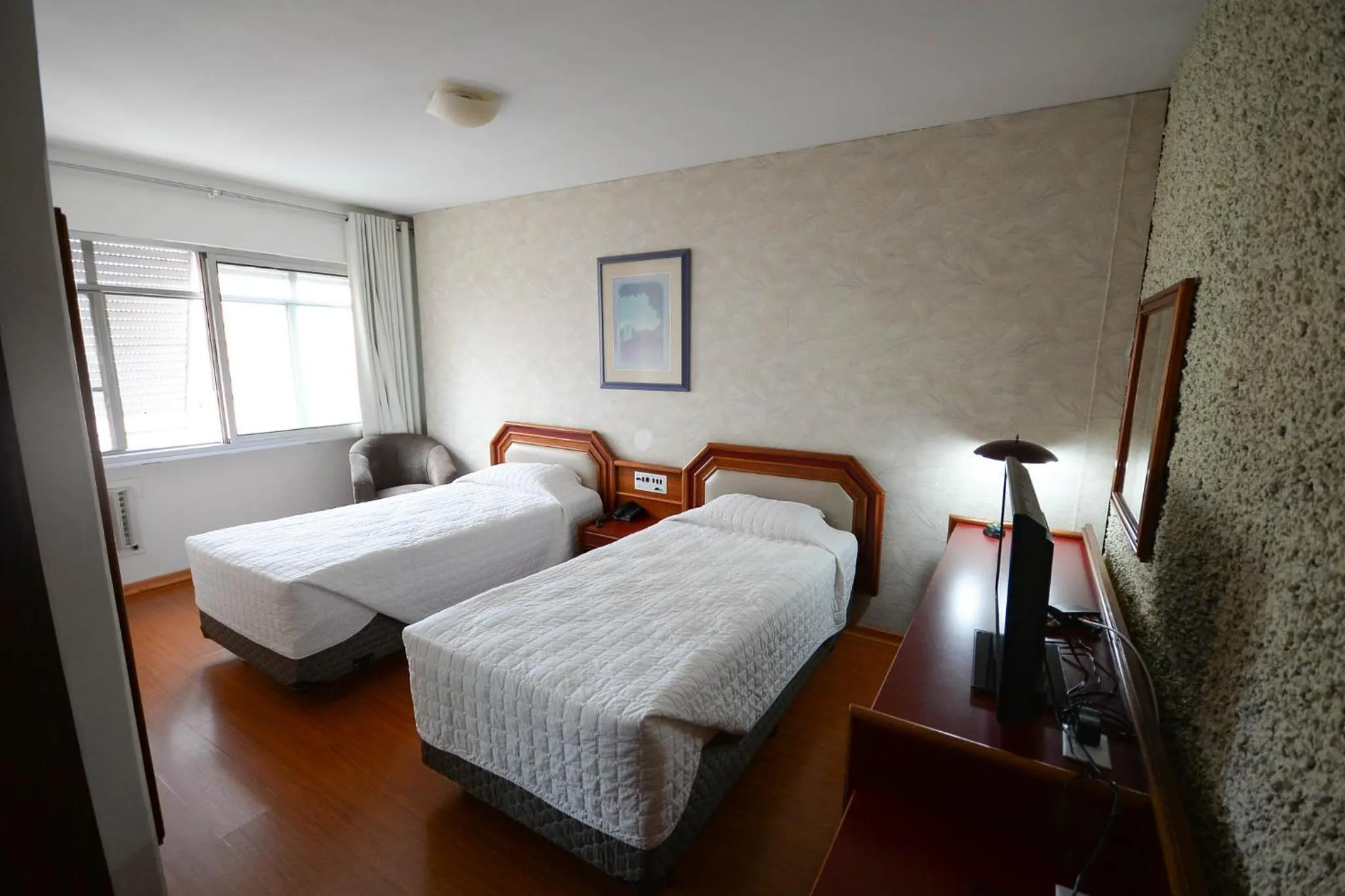 Bed in Caravelle Palace Hotel