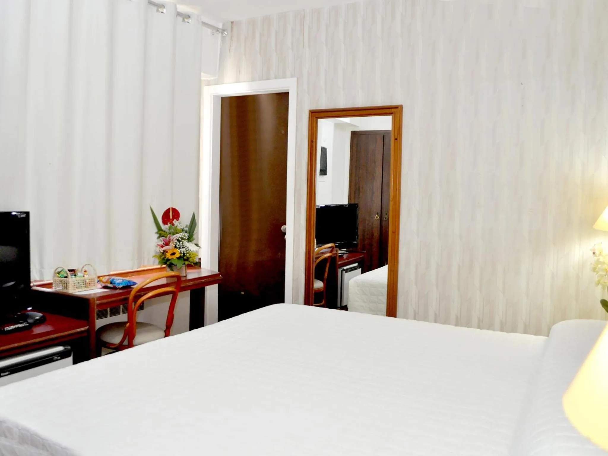 Bed in Caravelle Palace Hotel