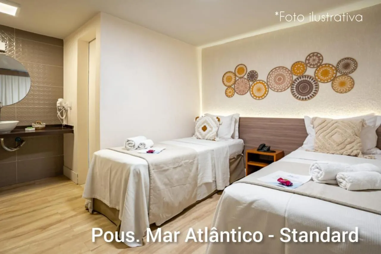 Bed in Pousada Mar Atlântico