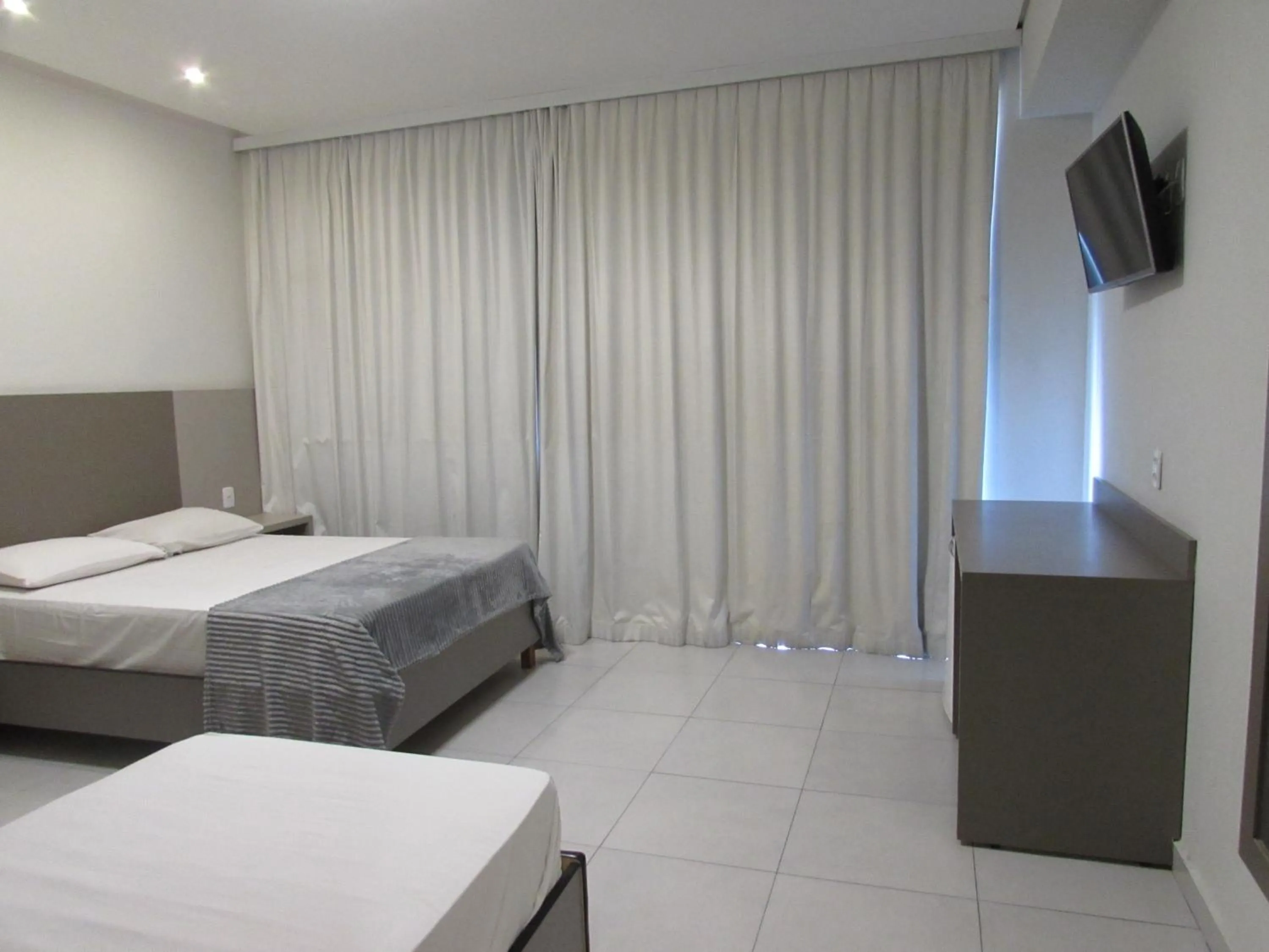 Bed in Hotel Urbis a 10 minutos Rua 25 de Março, Brás,Bom Retiro,a 2 minutos do Mirante Sampa Sky