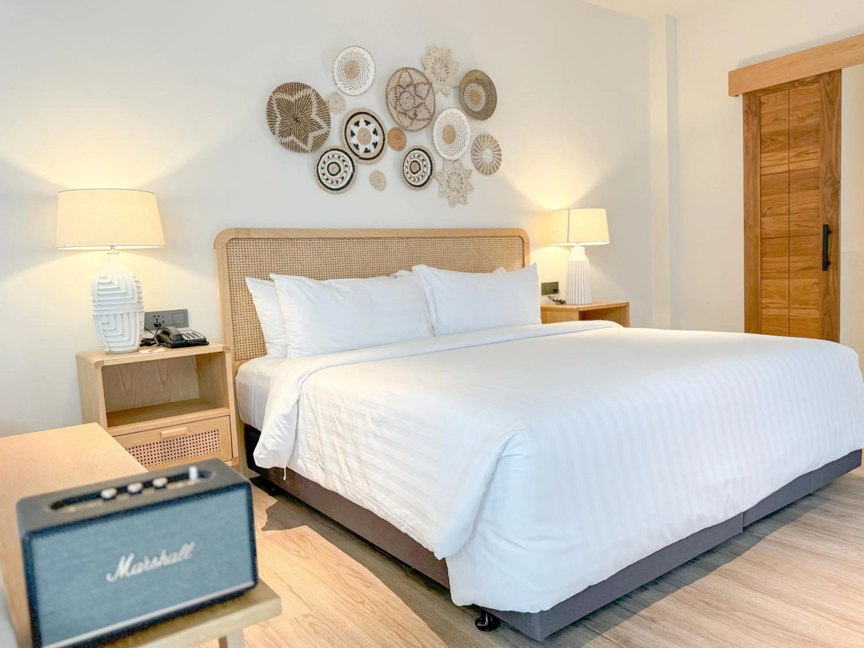 Bed in Baan Haad Ngam Boutique Resort