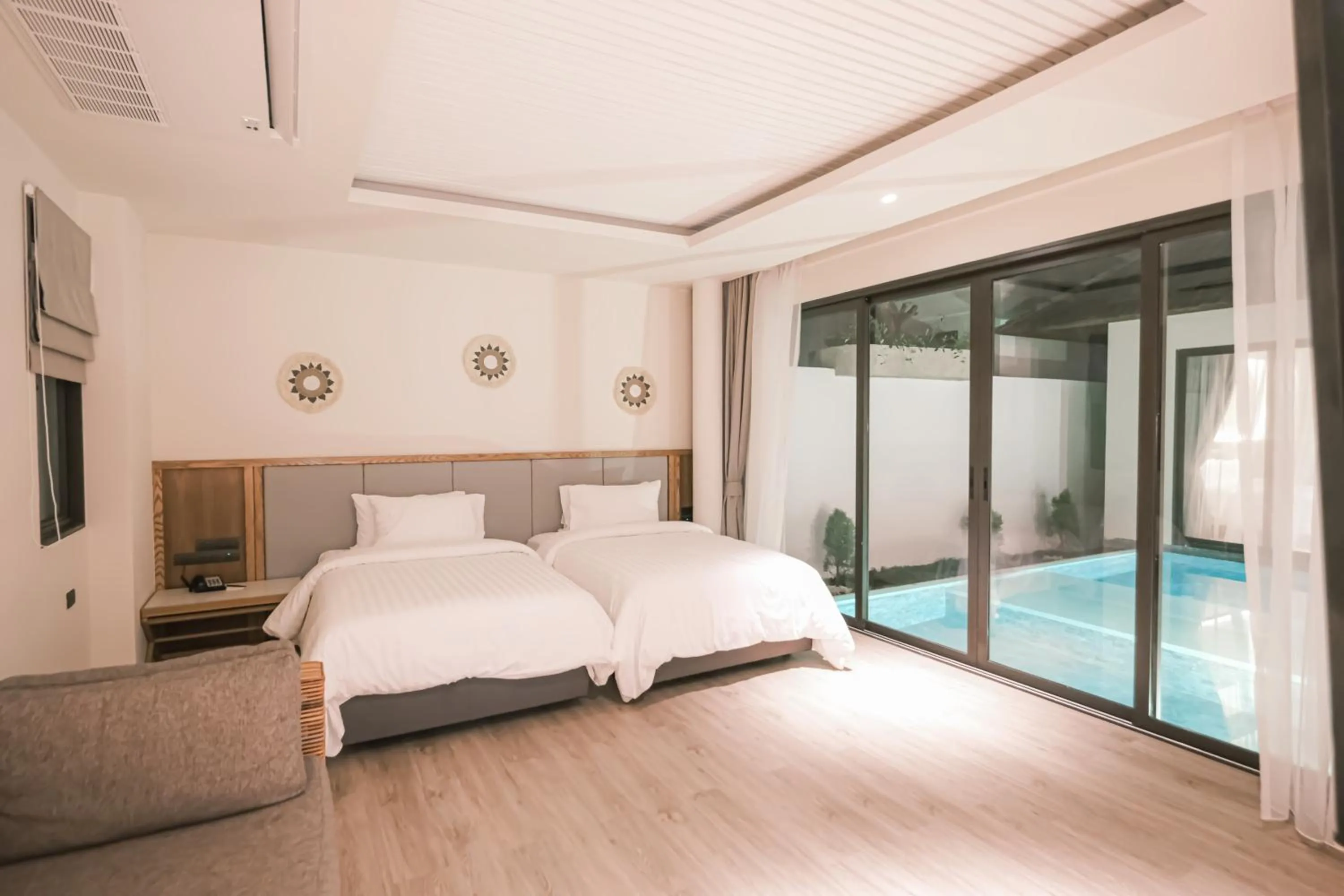 Bed in Baan Haad Ngam Boutique Resort