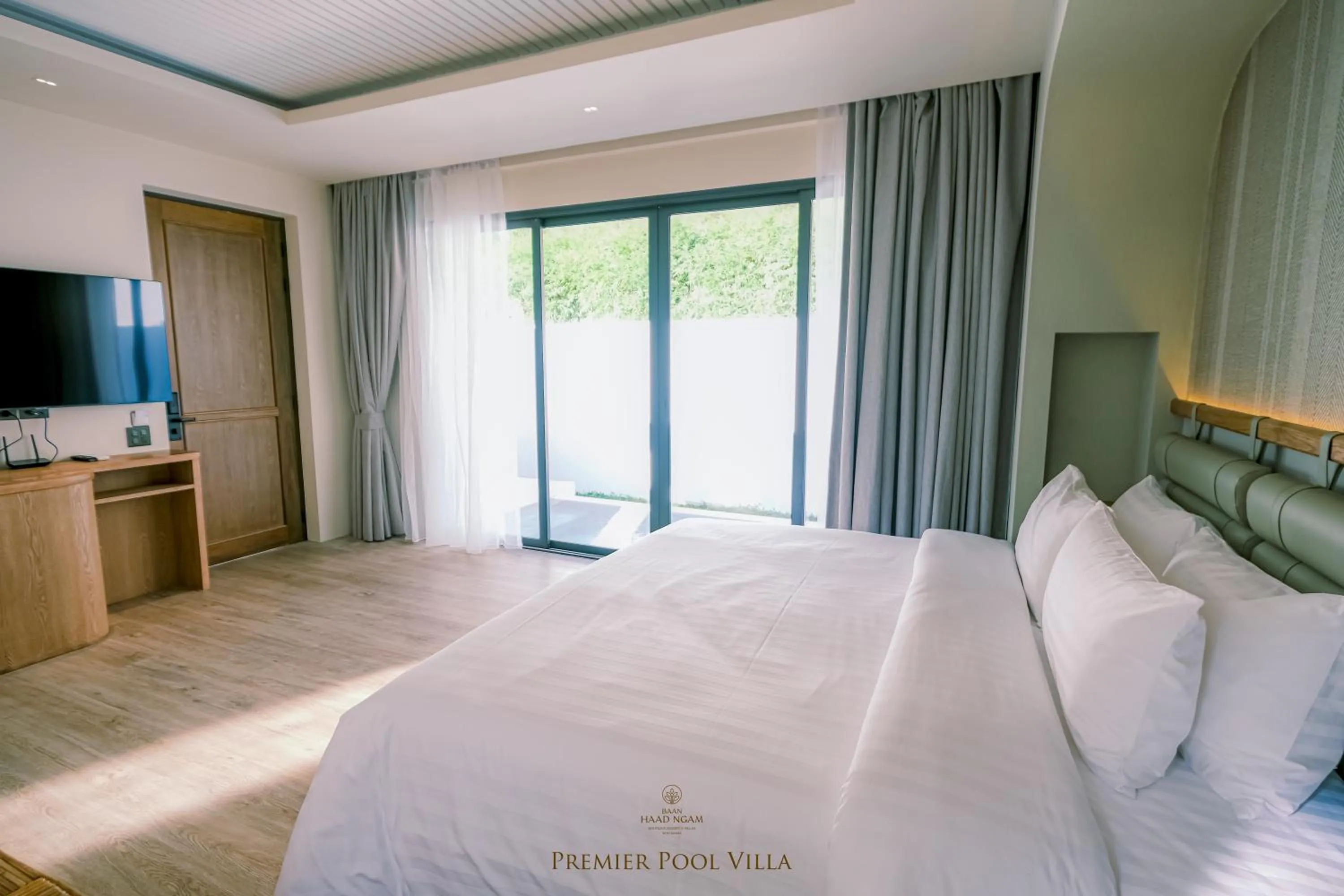 Bed in Baan Haad Ngam Boutique Resort