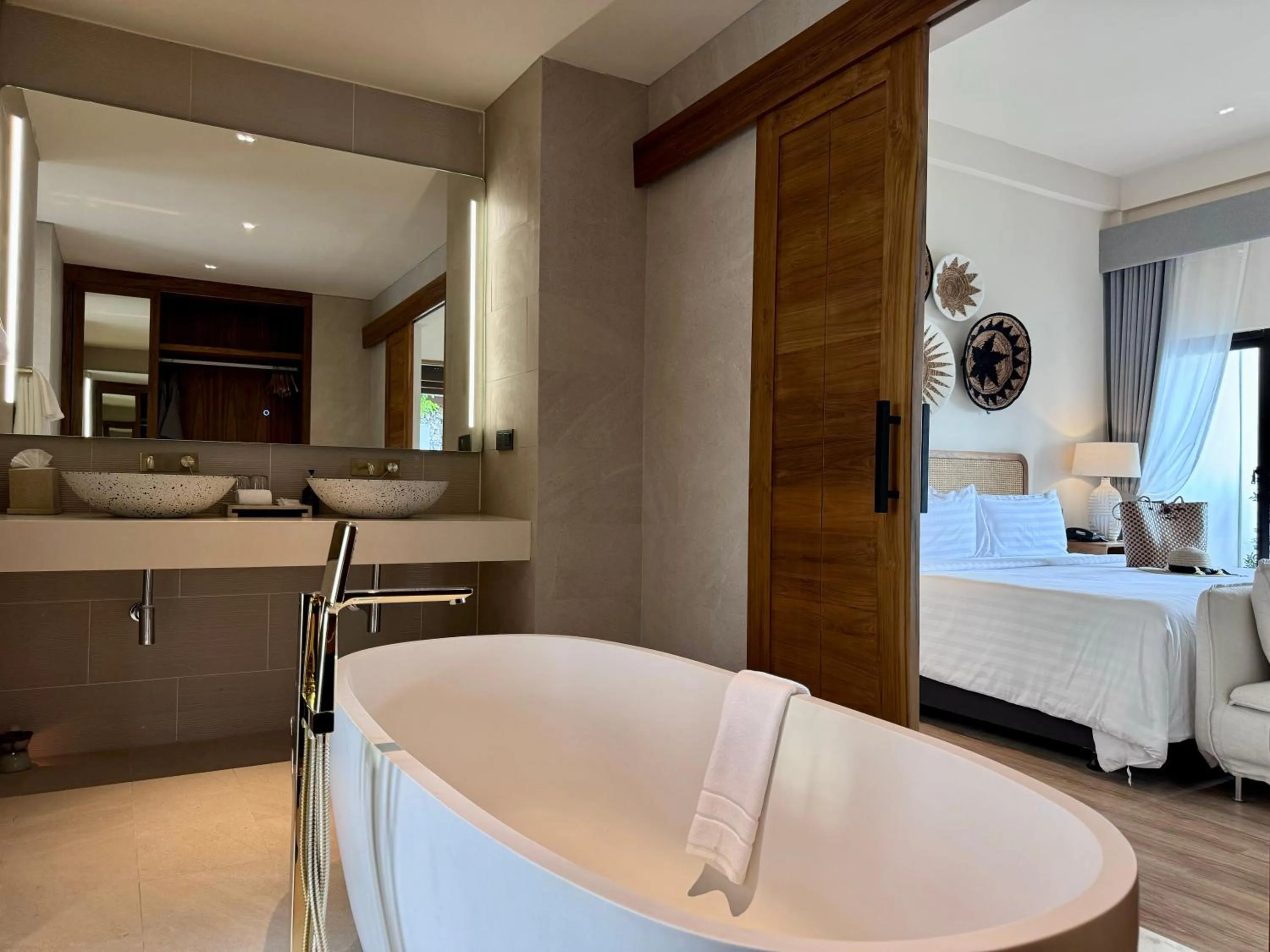 Bed in Baan Haad Ngam Boutique Resort