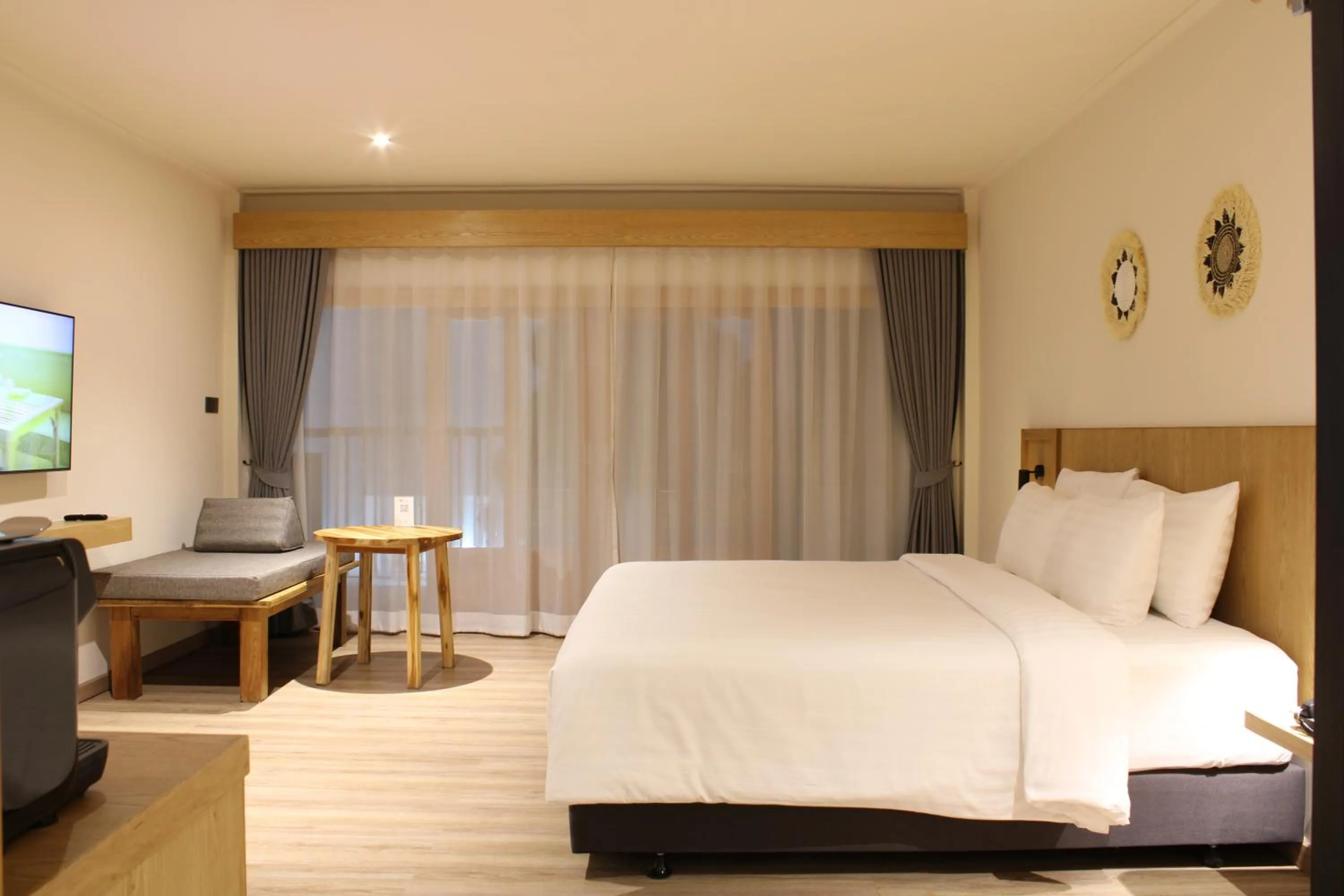 Bed in Baan Haad Ngam Boutique Resort