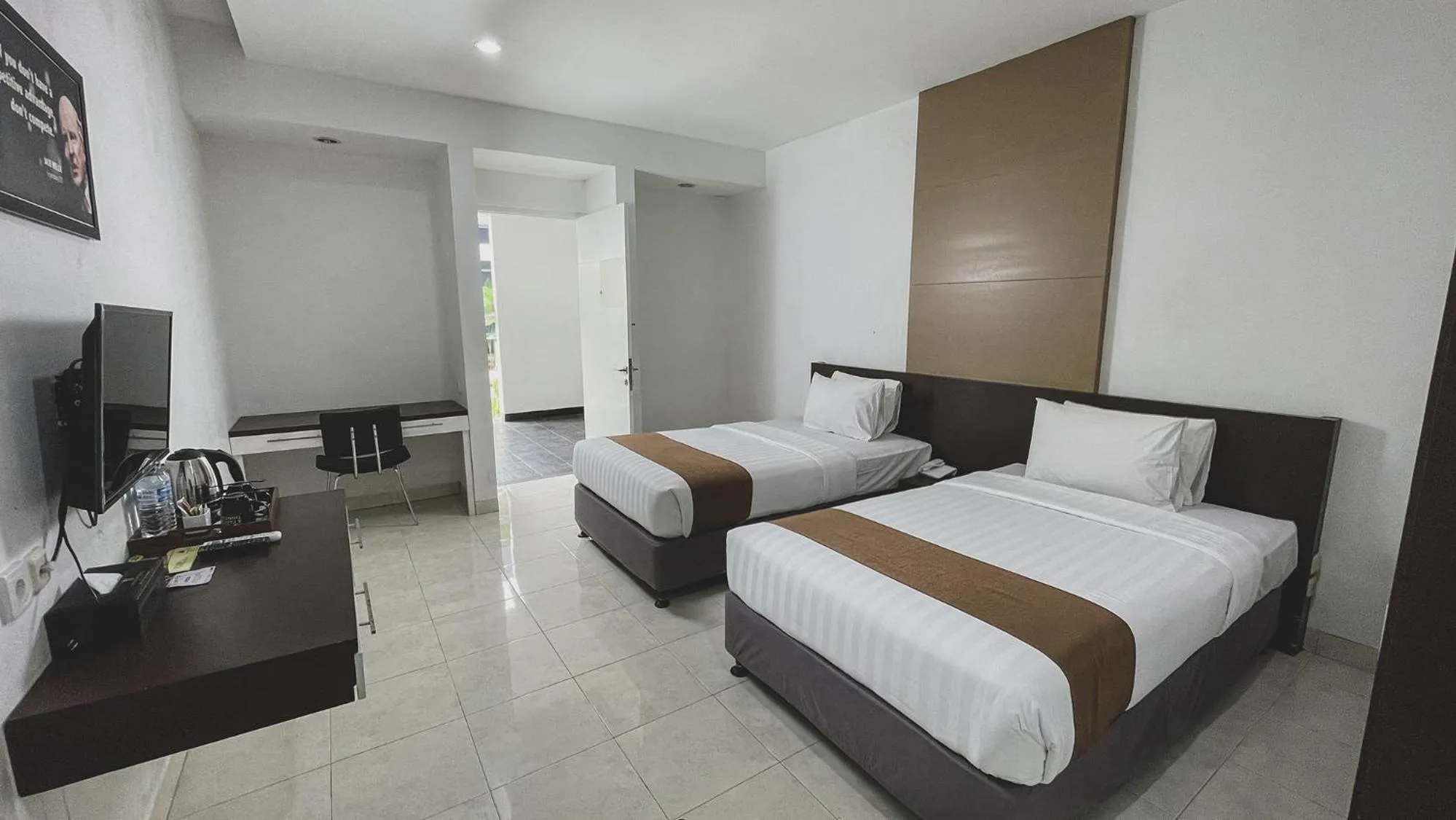 Bed in LPP Convention Hotel Demangan