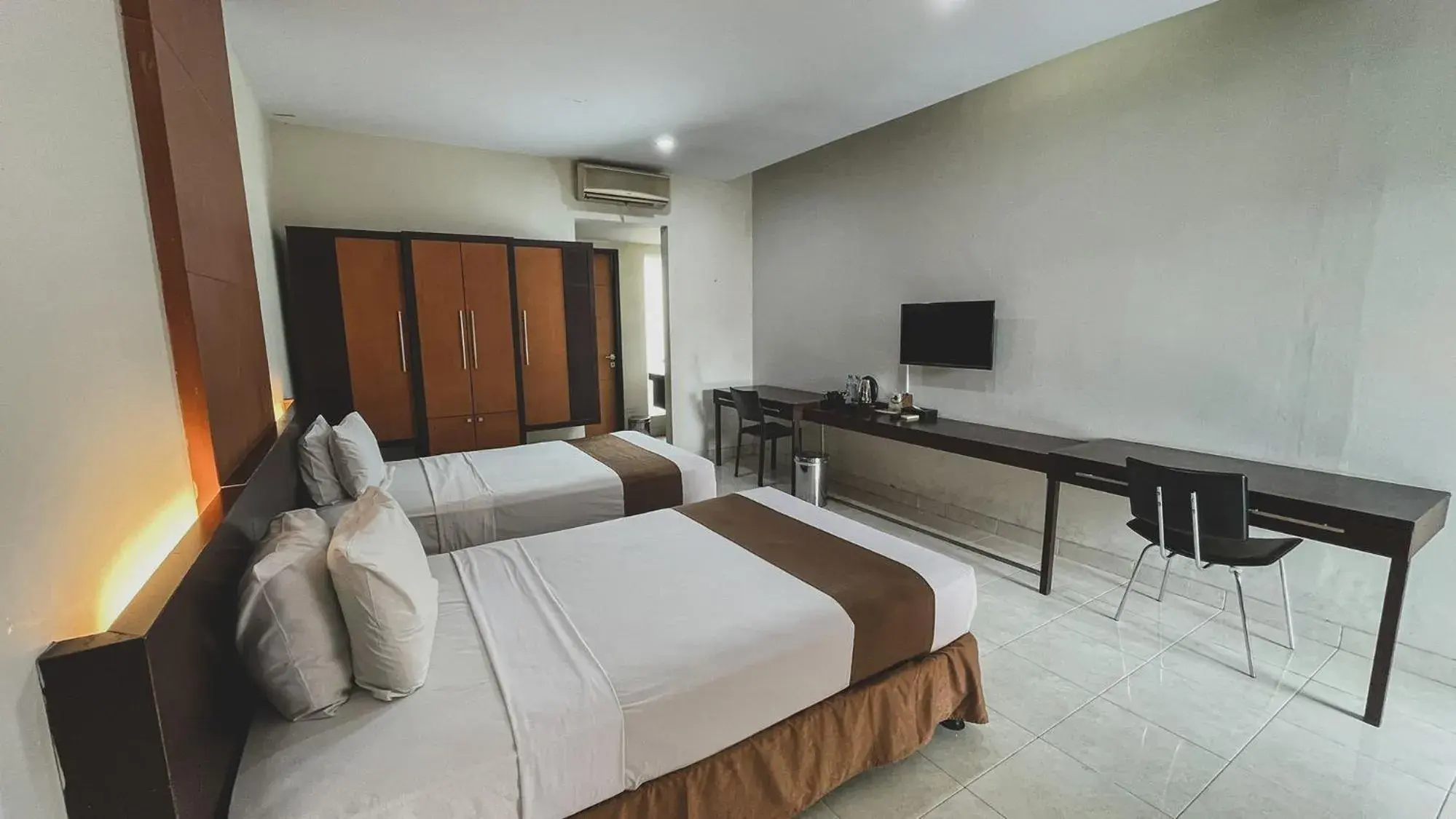 Bed in LPP Convention Hotel Demangan Bed in LPP Convention Hotel Demangan