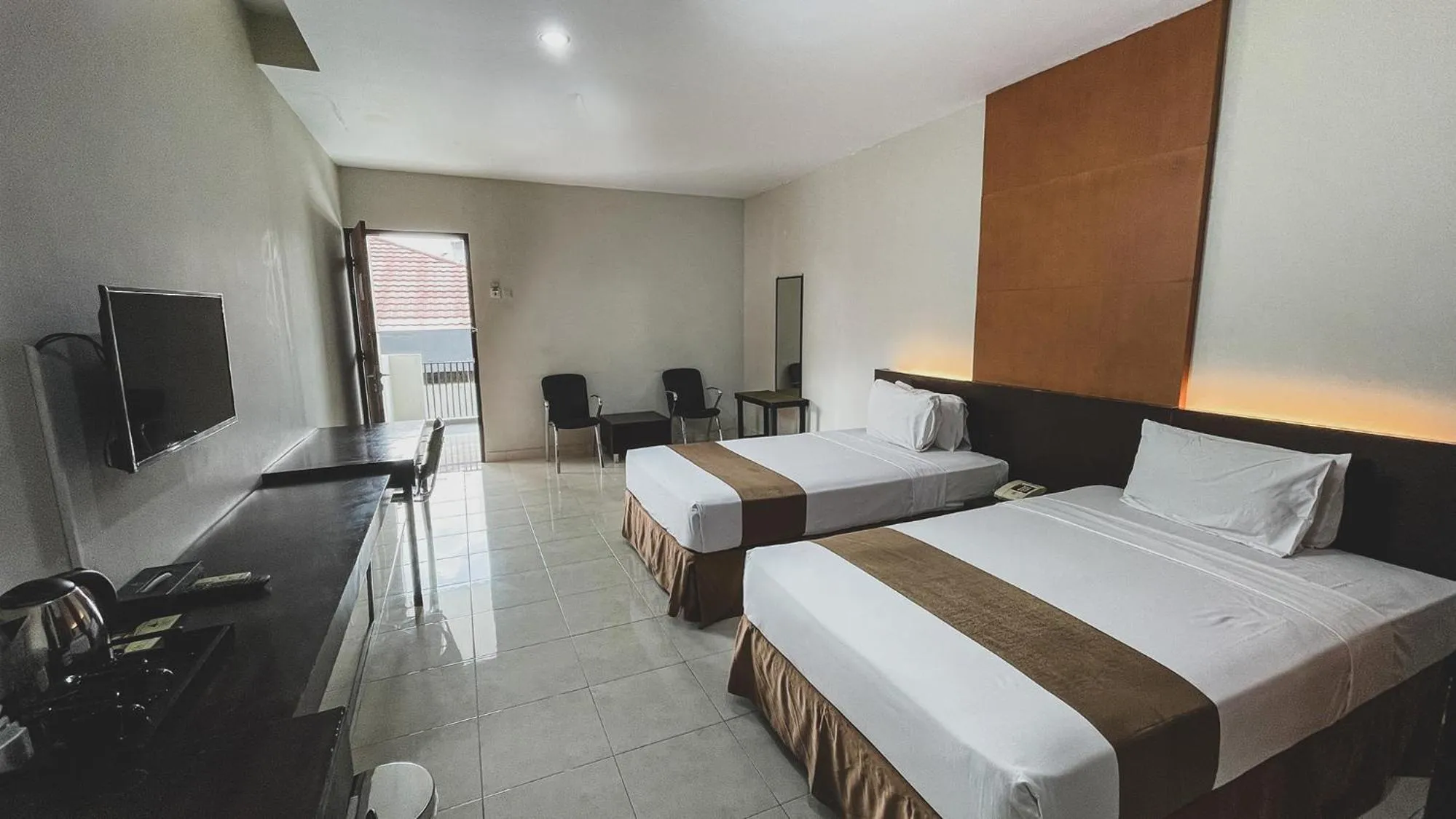 Bed in LPP Convention Hotel Demangan