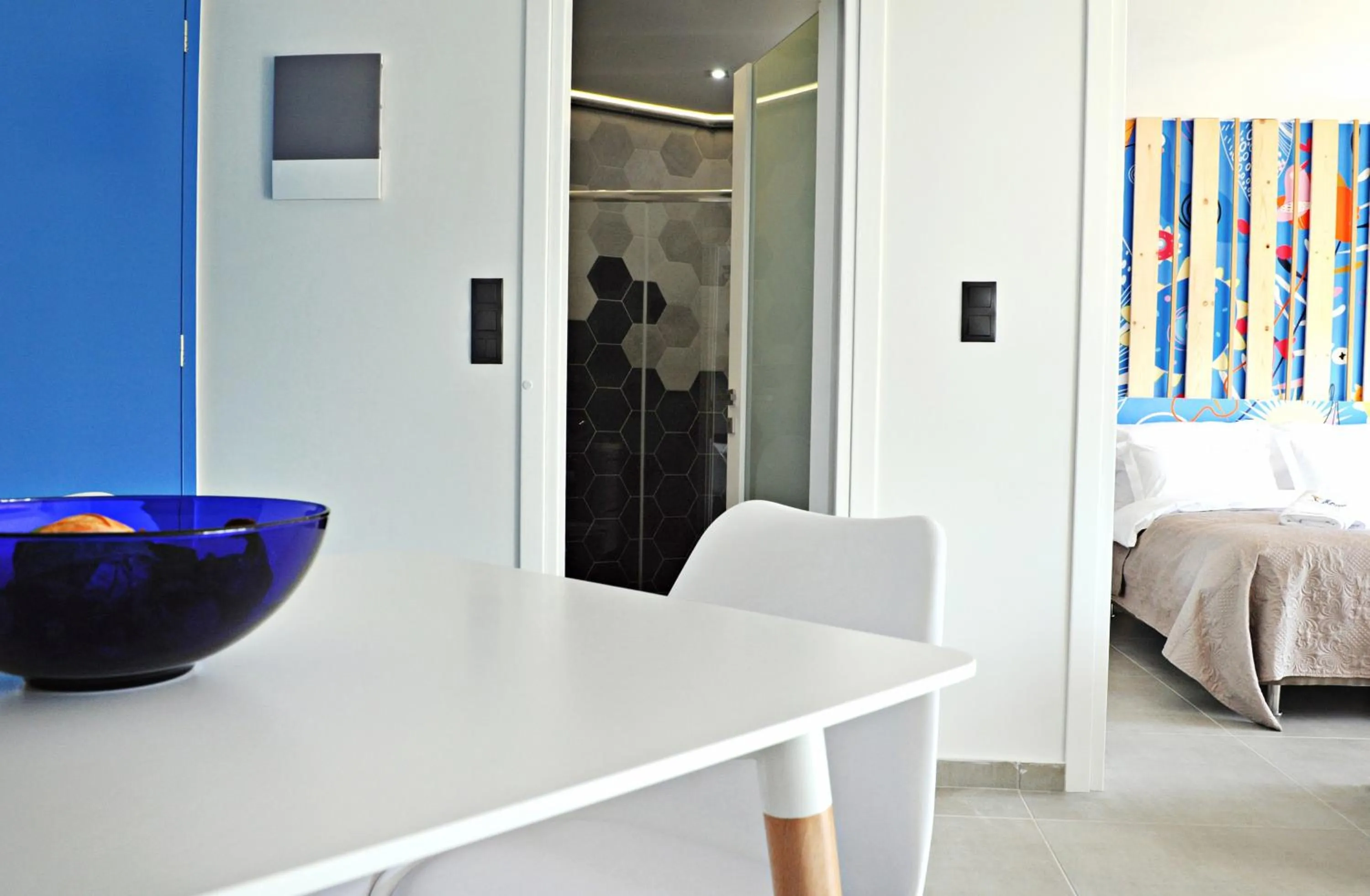 Dining area, Bed in The Athenians Modern Apartments
