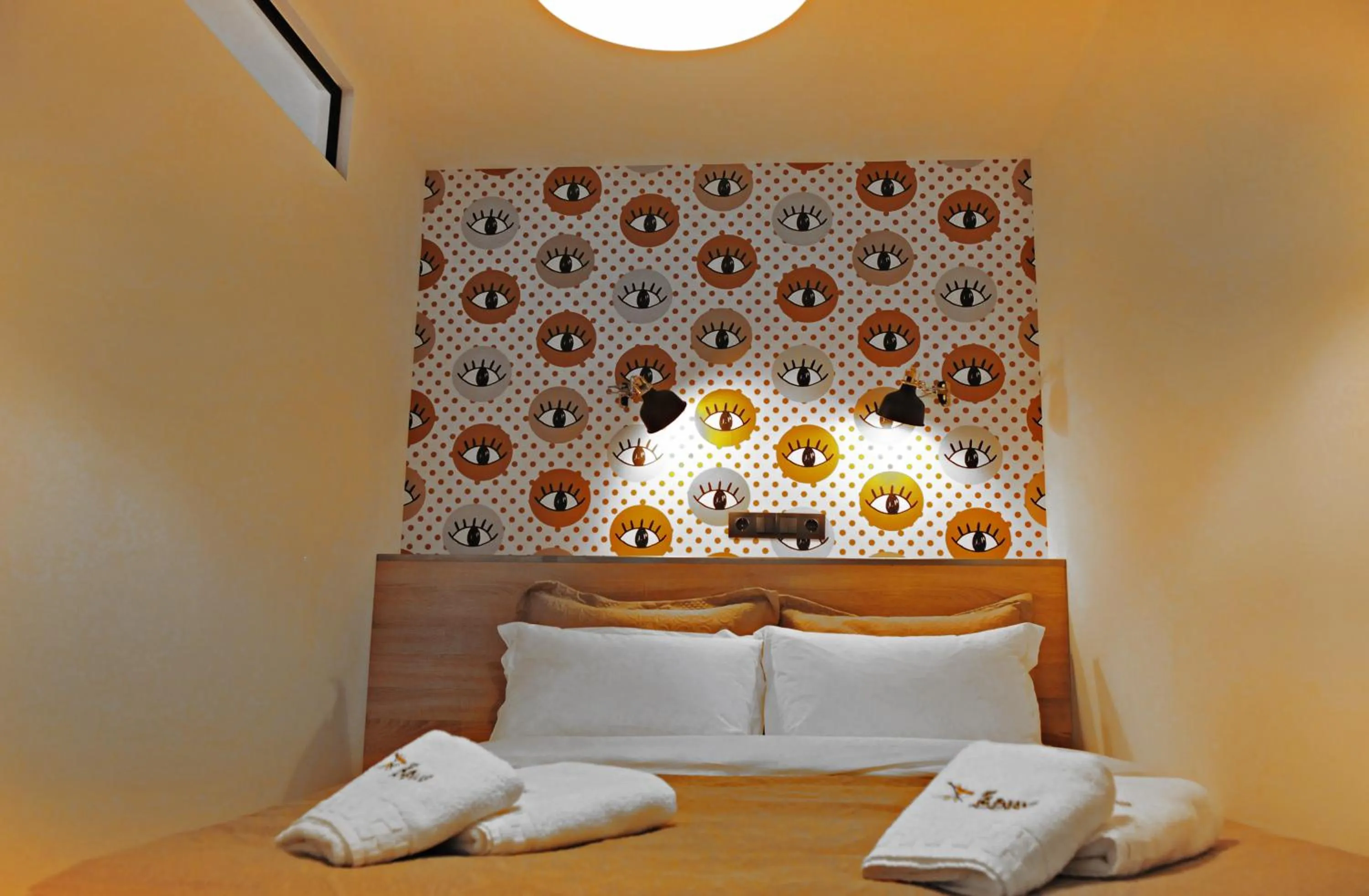 Bed in The Athenians Modern Apartments