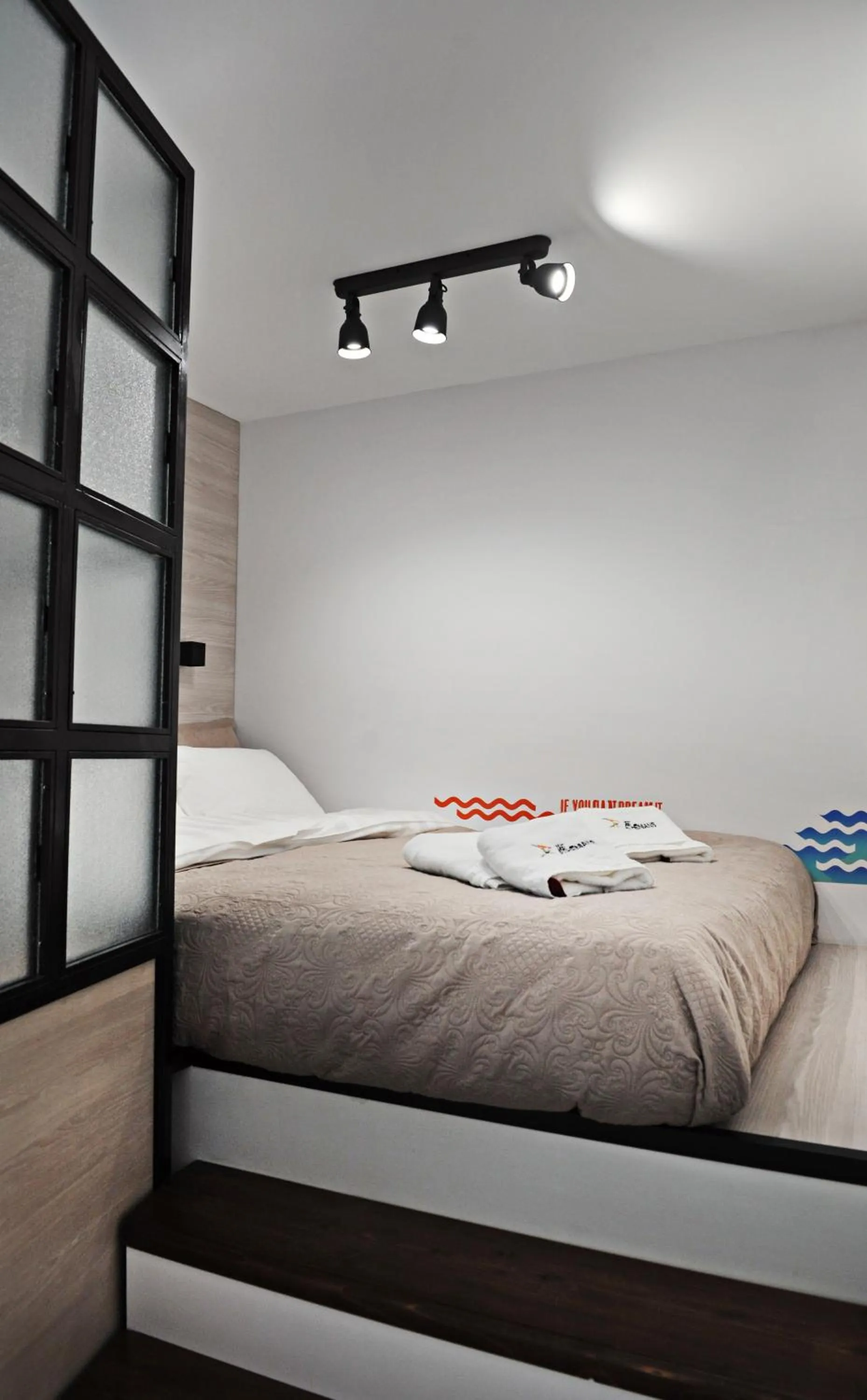 Bed in The Athenians Modern Apartments