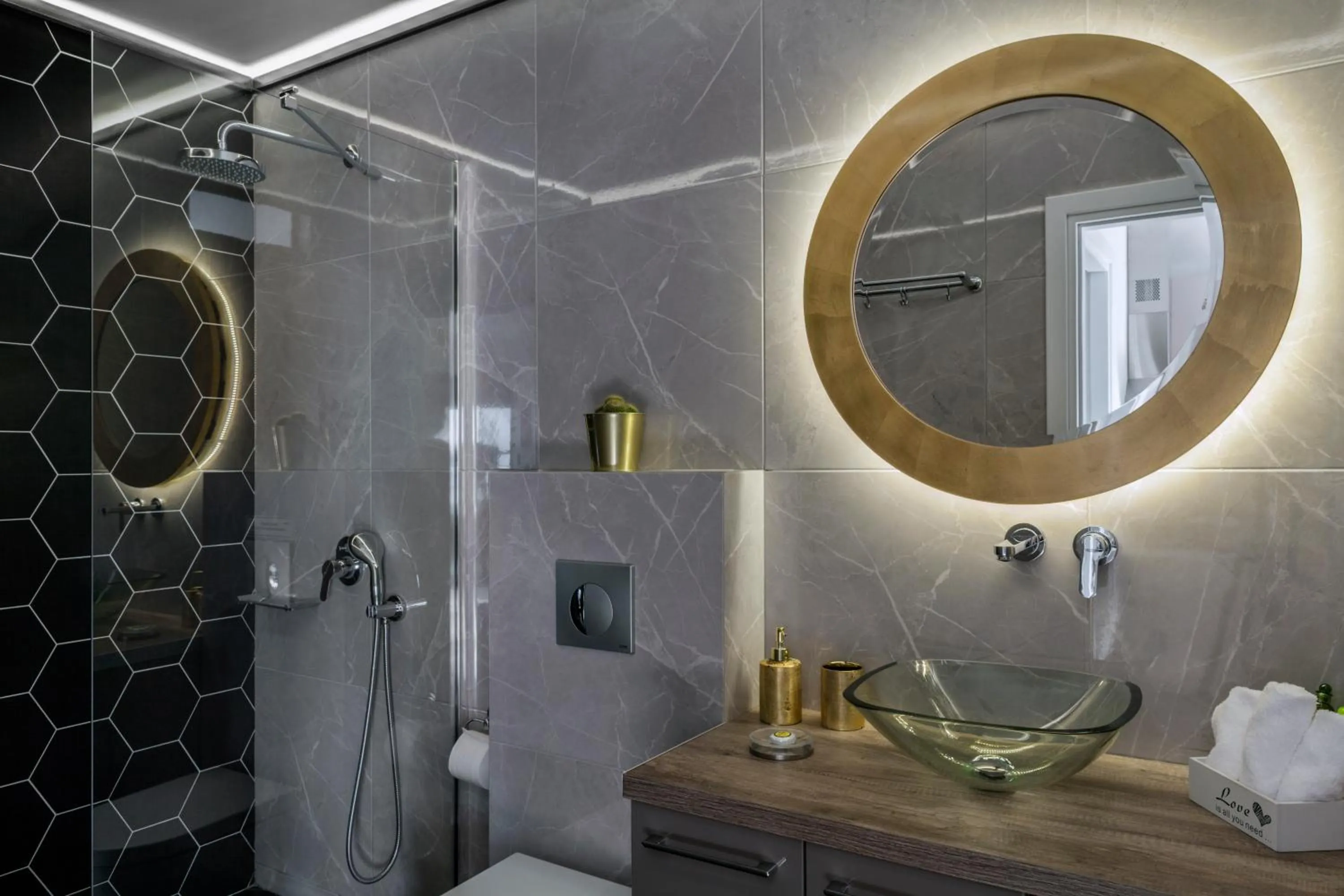 Shower in The Athenians Modern Apartments