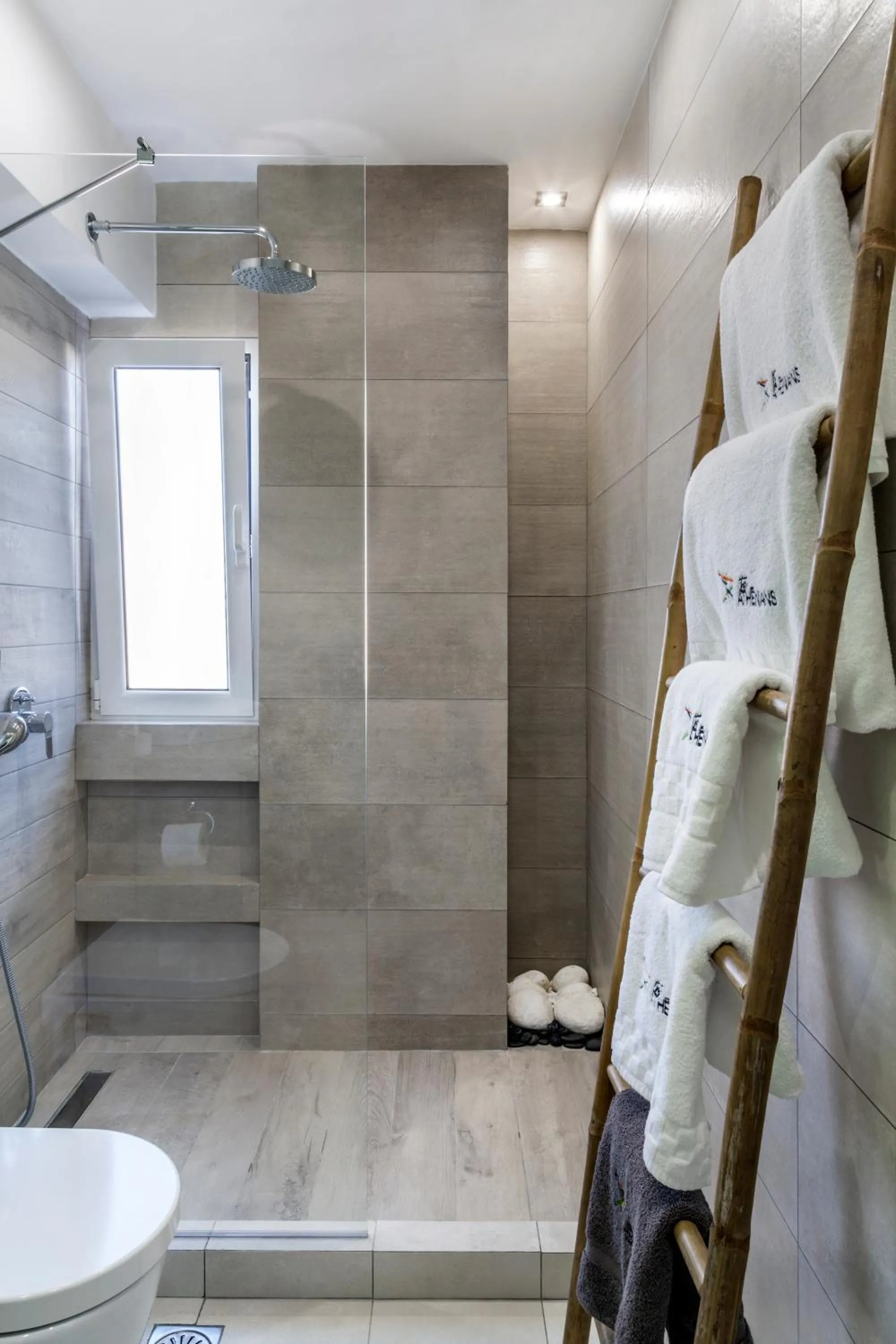 Shower in The Athenians Modern Apartments