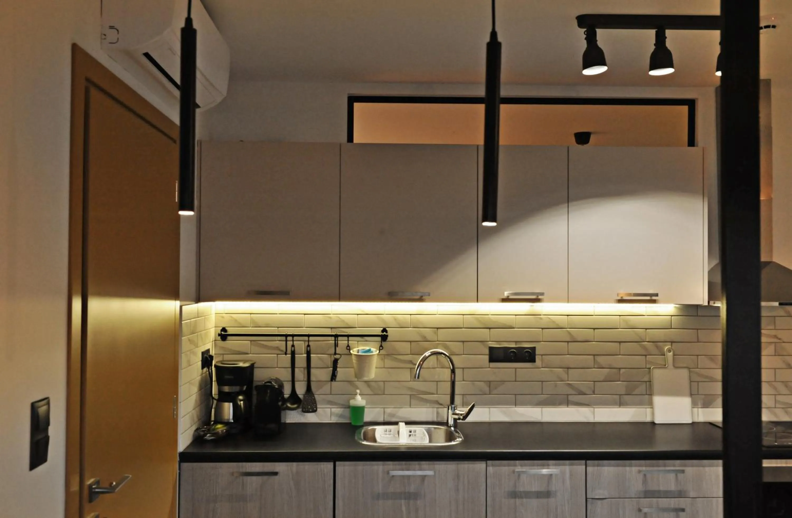 Kitchen or kitchenette in The Athenians Modern Apartments