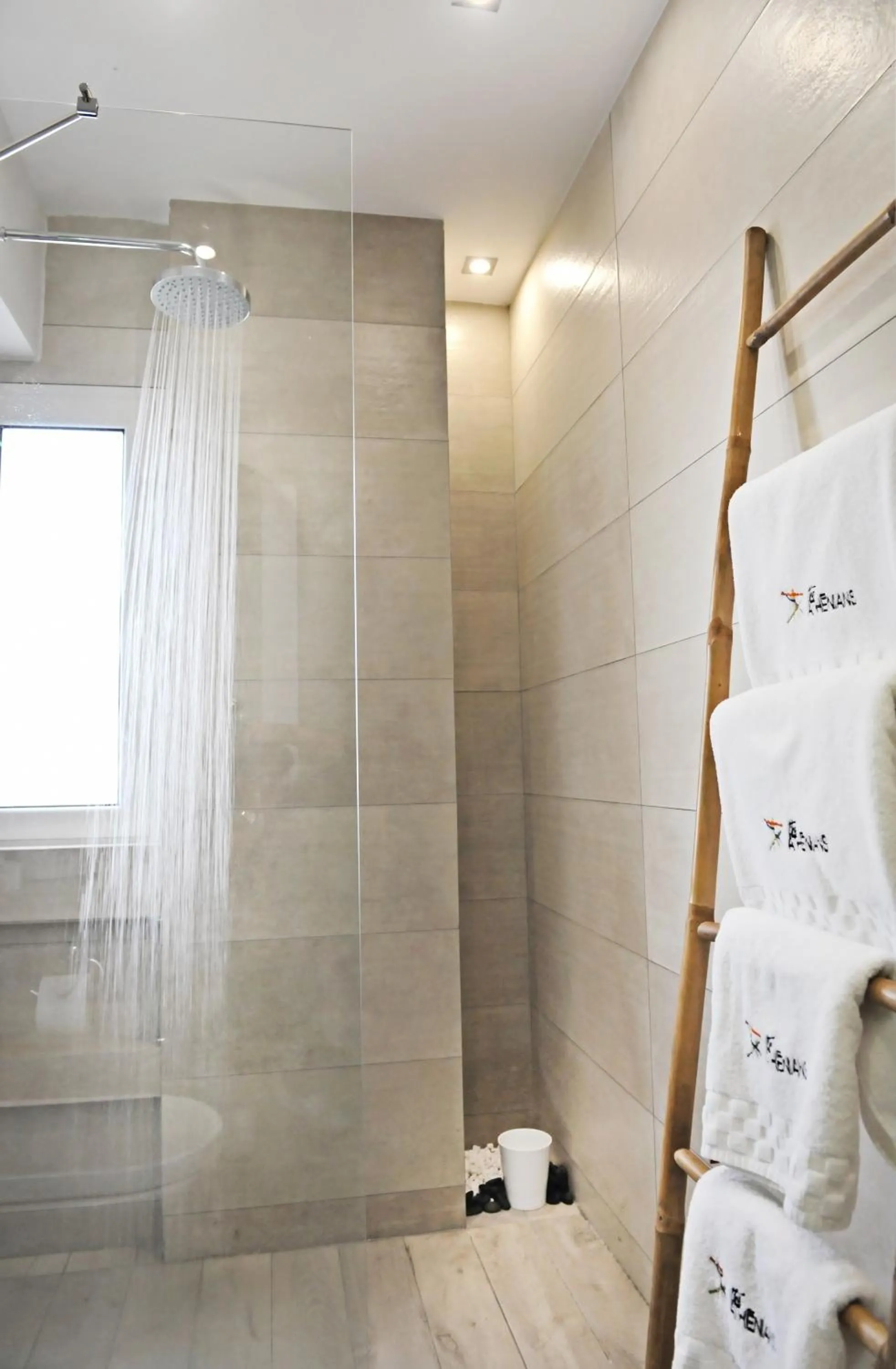 Shower in The Athenians Modern Apartments