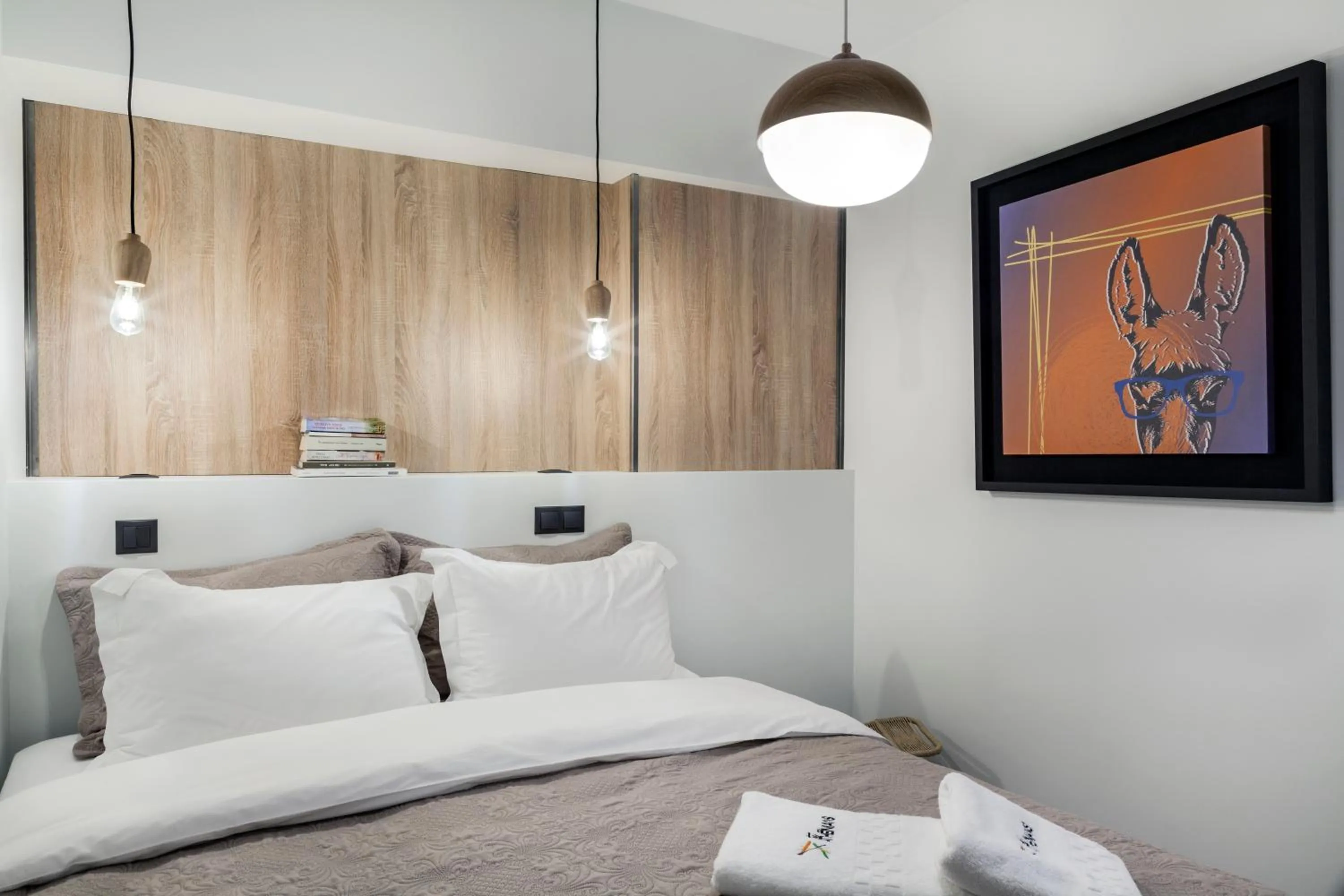 Bed in The Athenians Modern Apartments