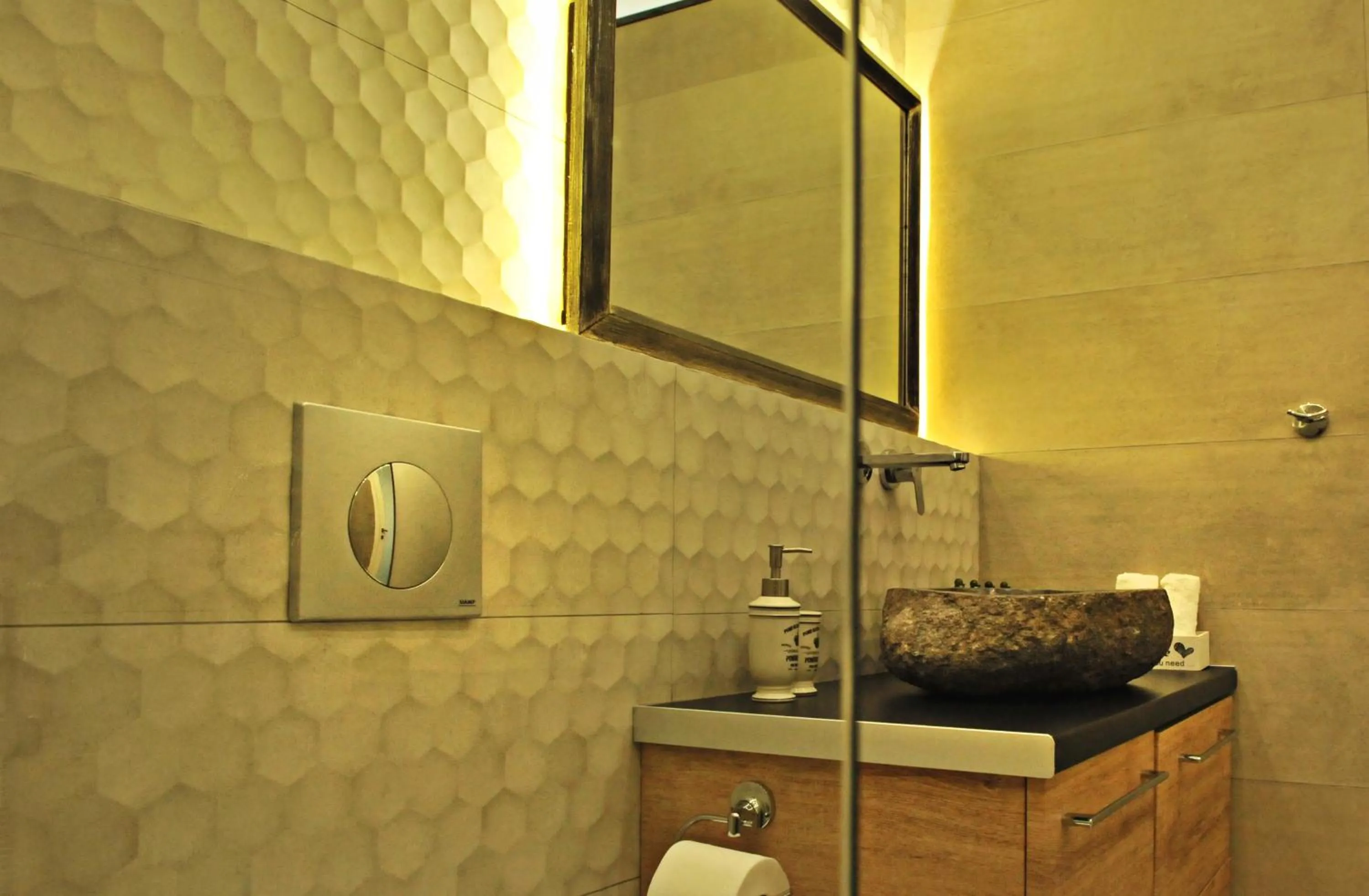 Bathroom in The Athenians Modern Apartments