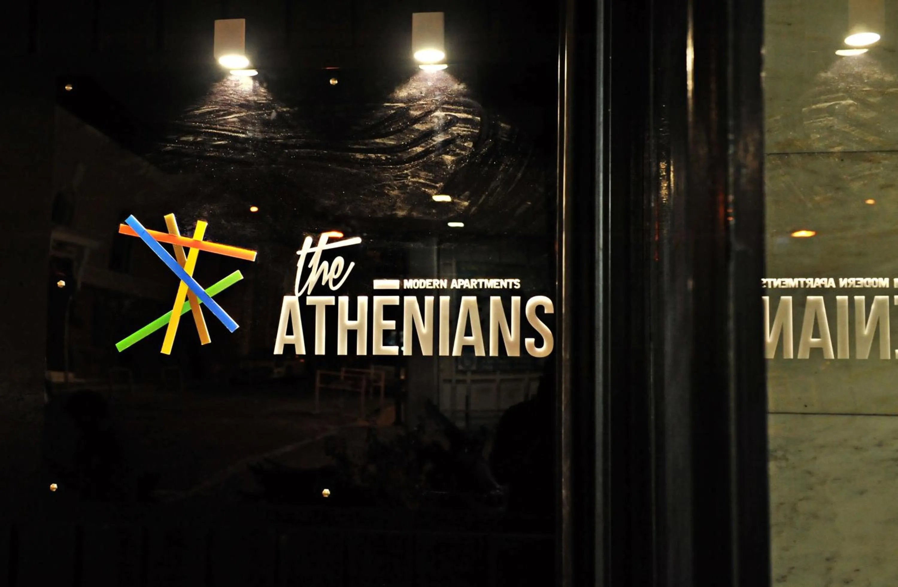 Property logo or sign in The Athenians Modern Apartments