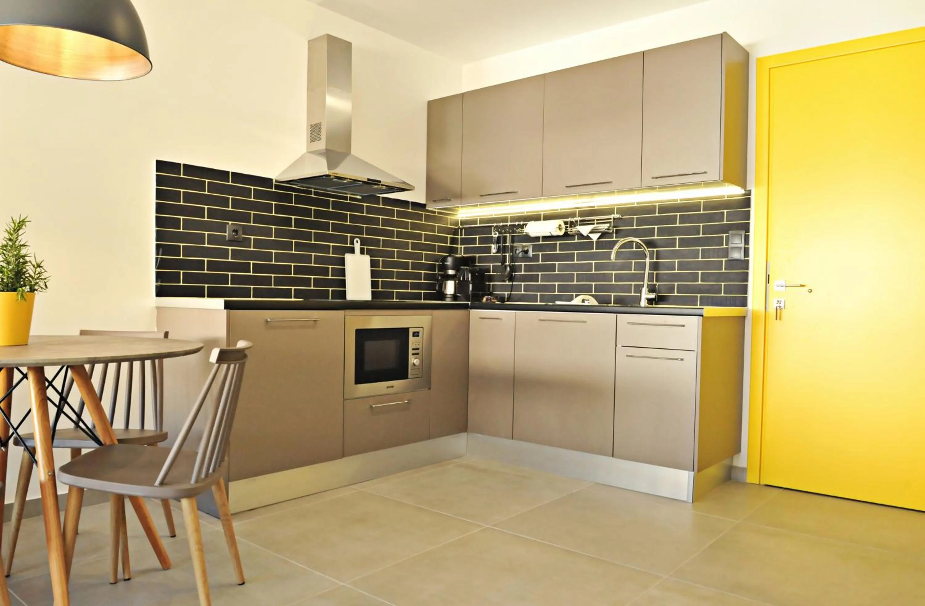 Kitchen or kitchenette in The Athenians Modern Apartments