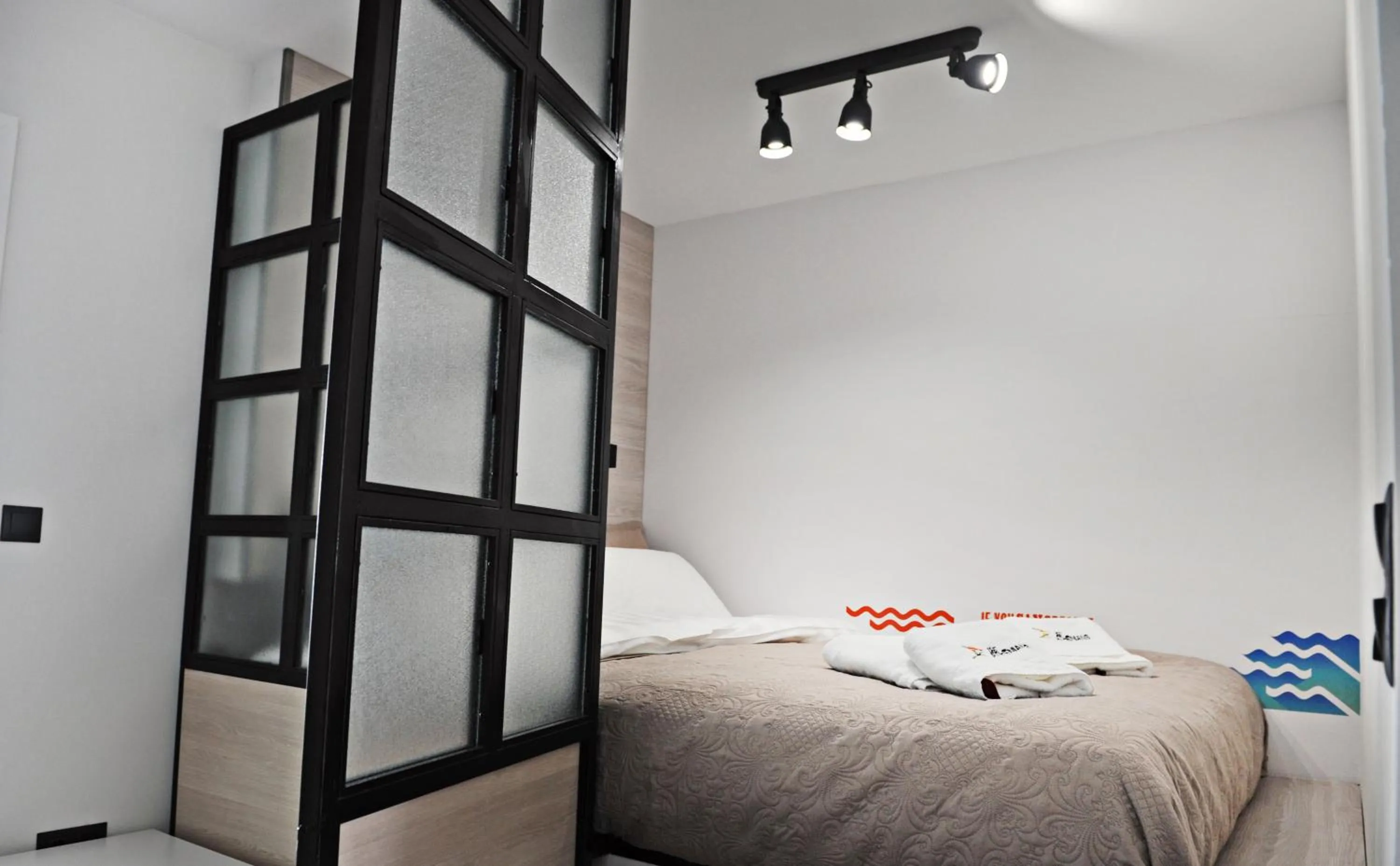 Bed in The Athenians Modern Apartments