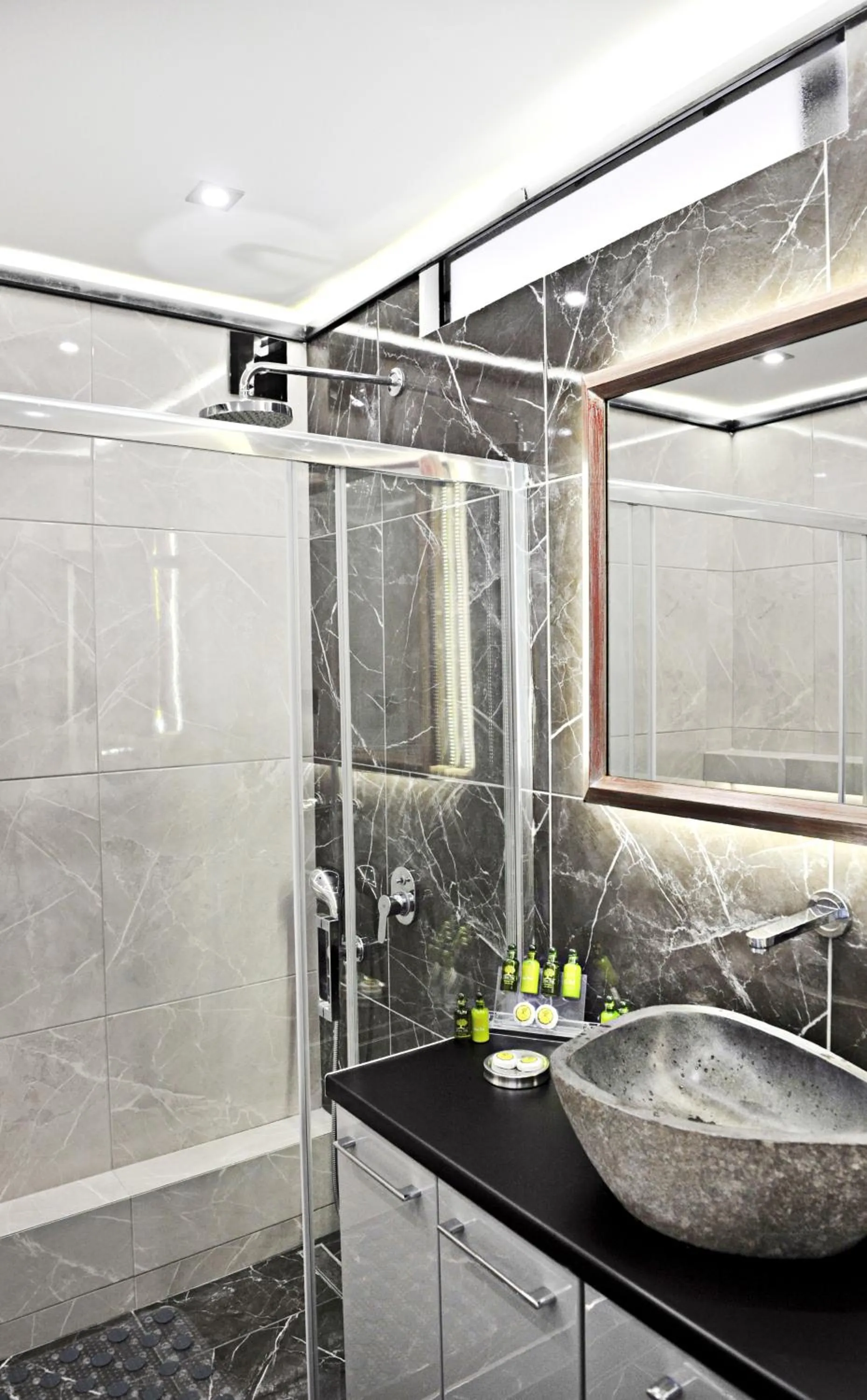 Shower in The Athenians Modern Apartments