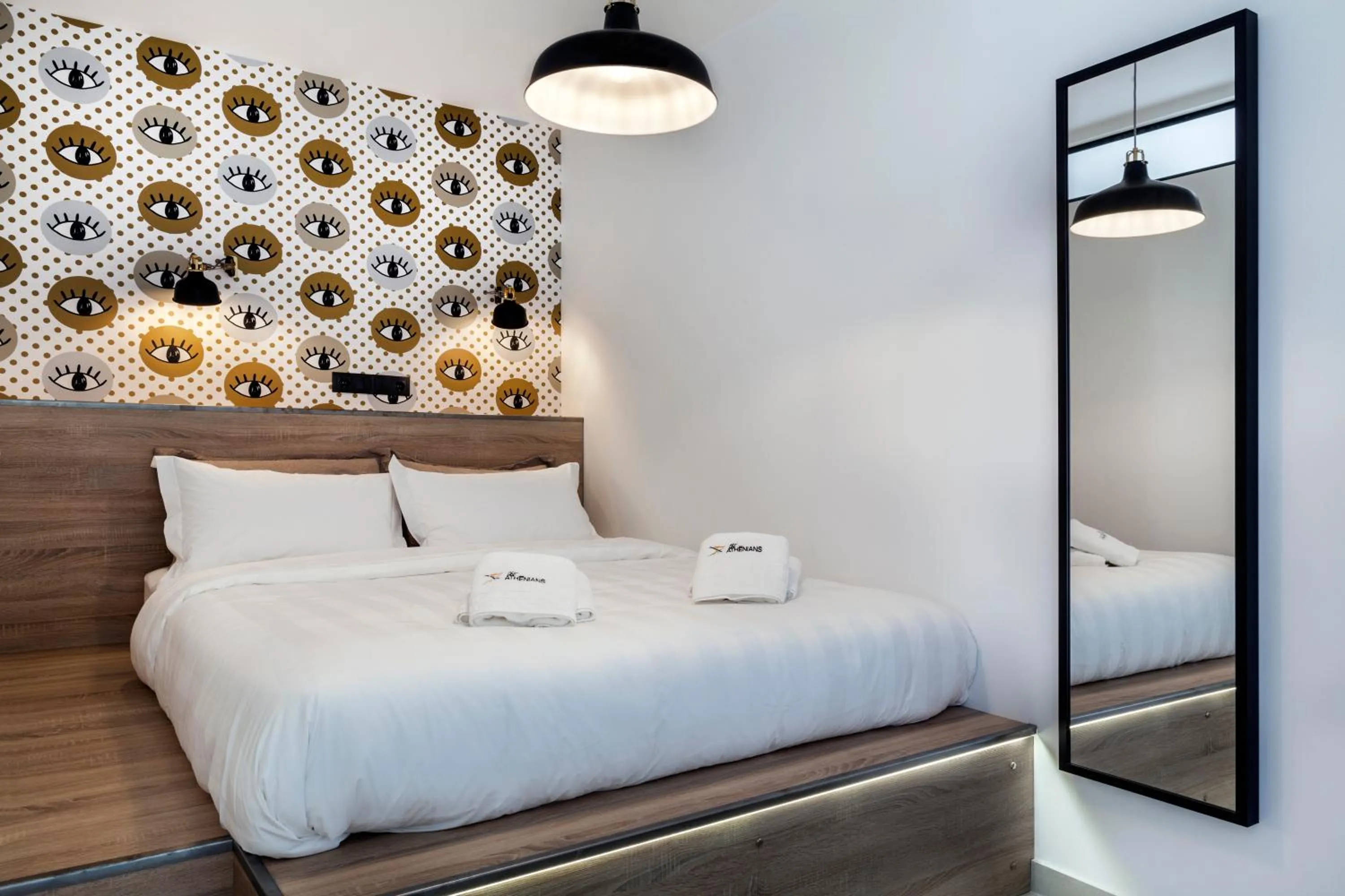 Bed in The Athenians Modern Apartments