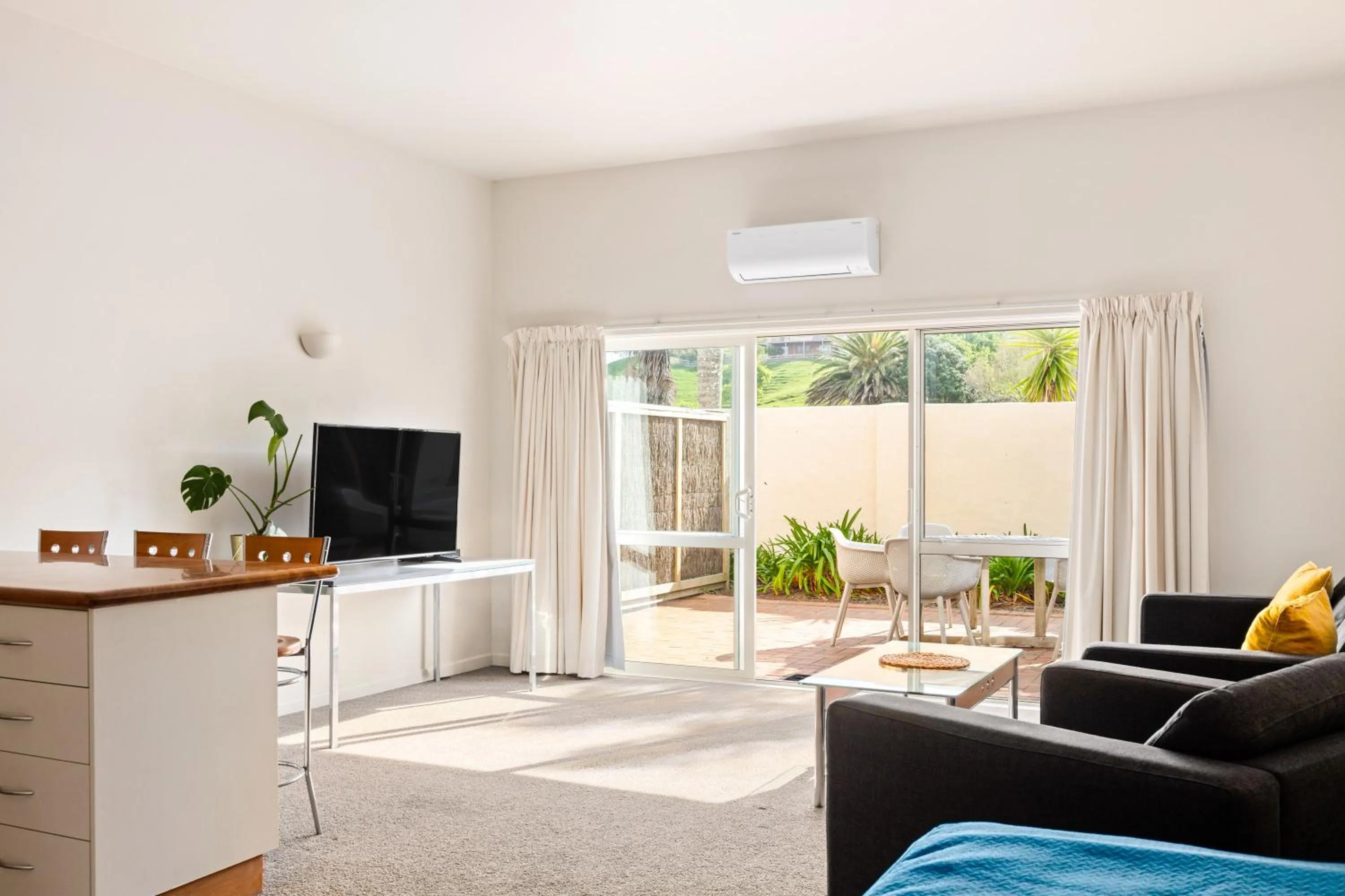Living room in Ocean Beach Wainui