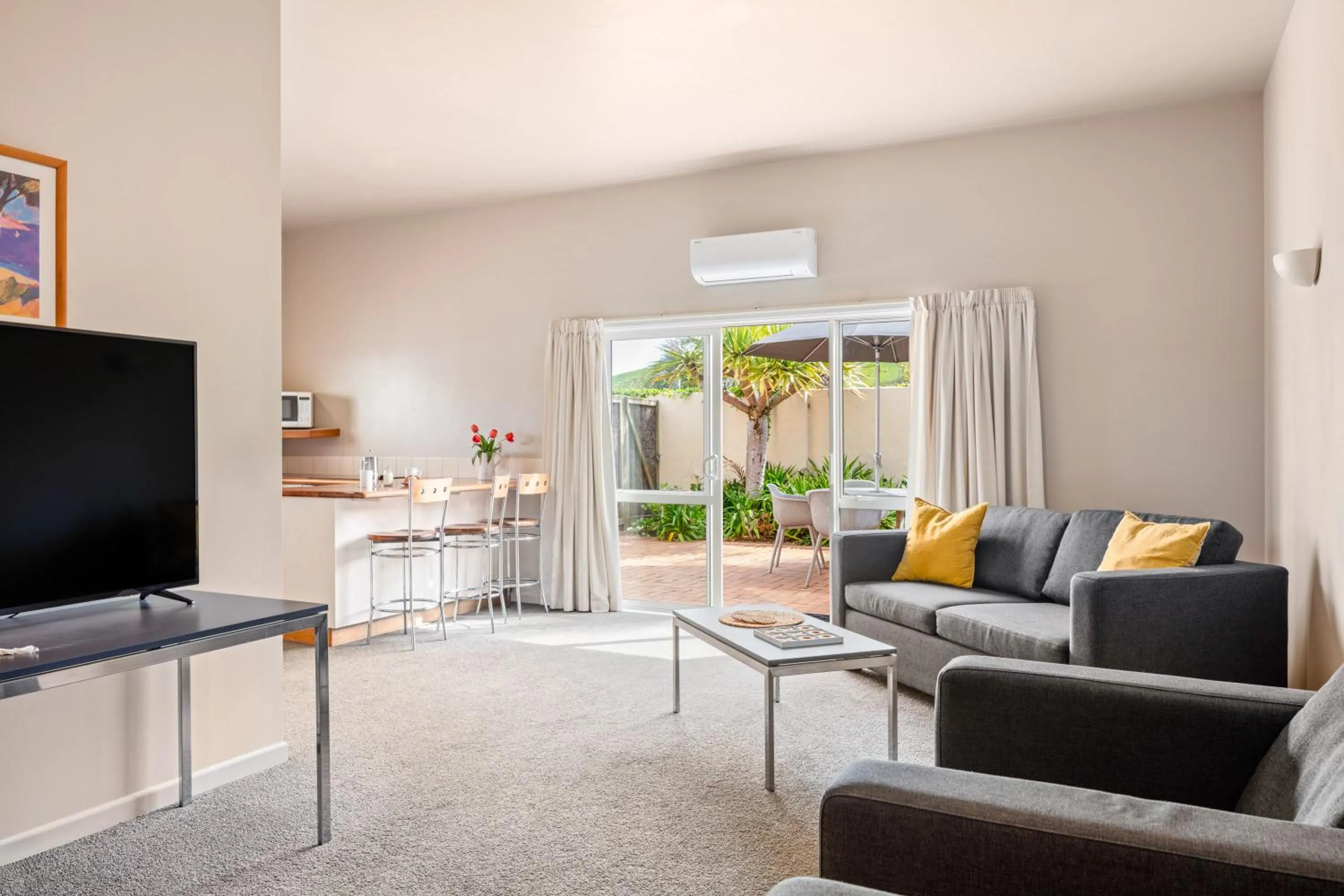 Living room in Ocean Beach Wainui