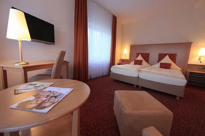Photo of the whole room, Bed in Landhotel Möllhagen