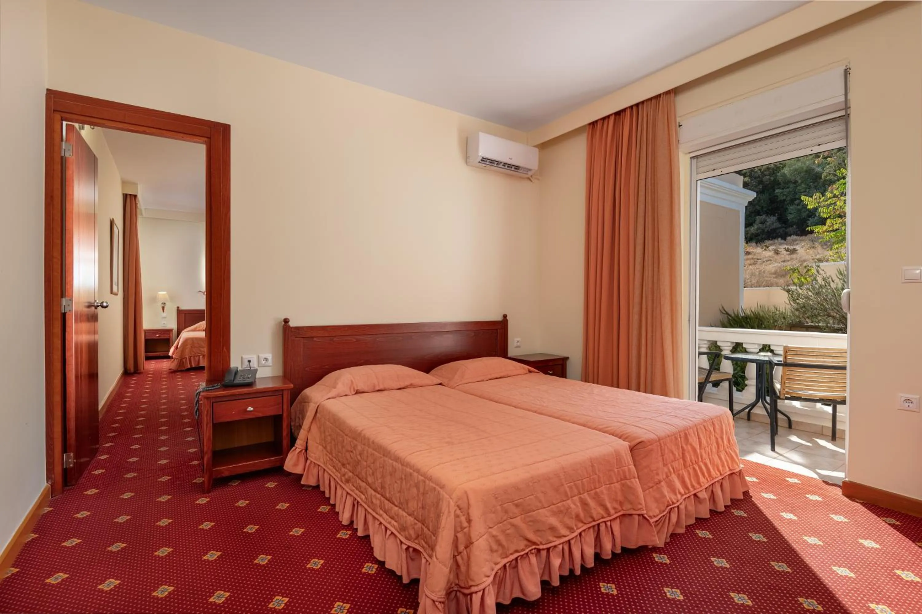 Bed in Crithoni's Paradise Hotel