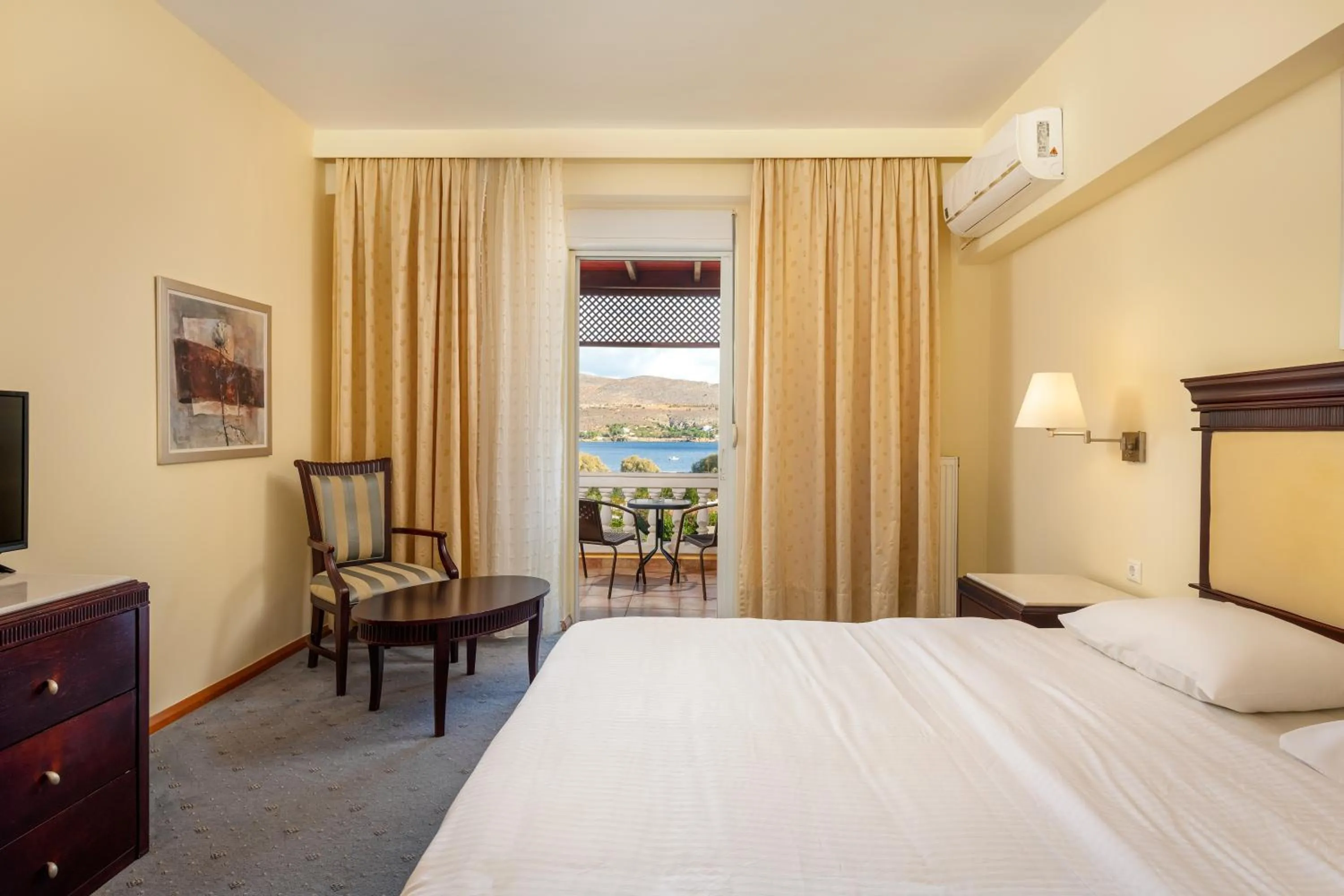 Bed in Crithoni's Paradise Hotel