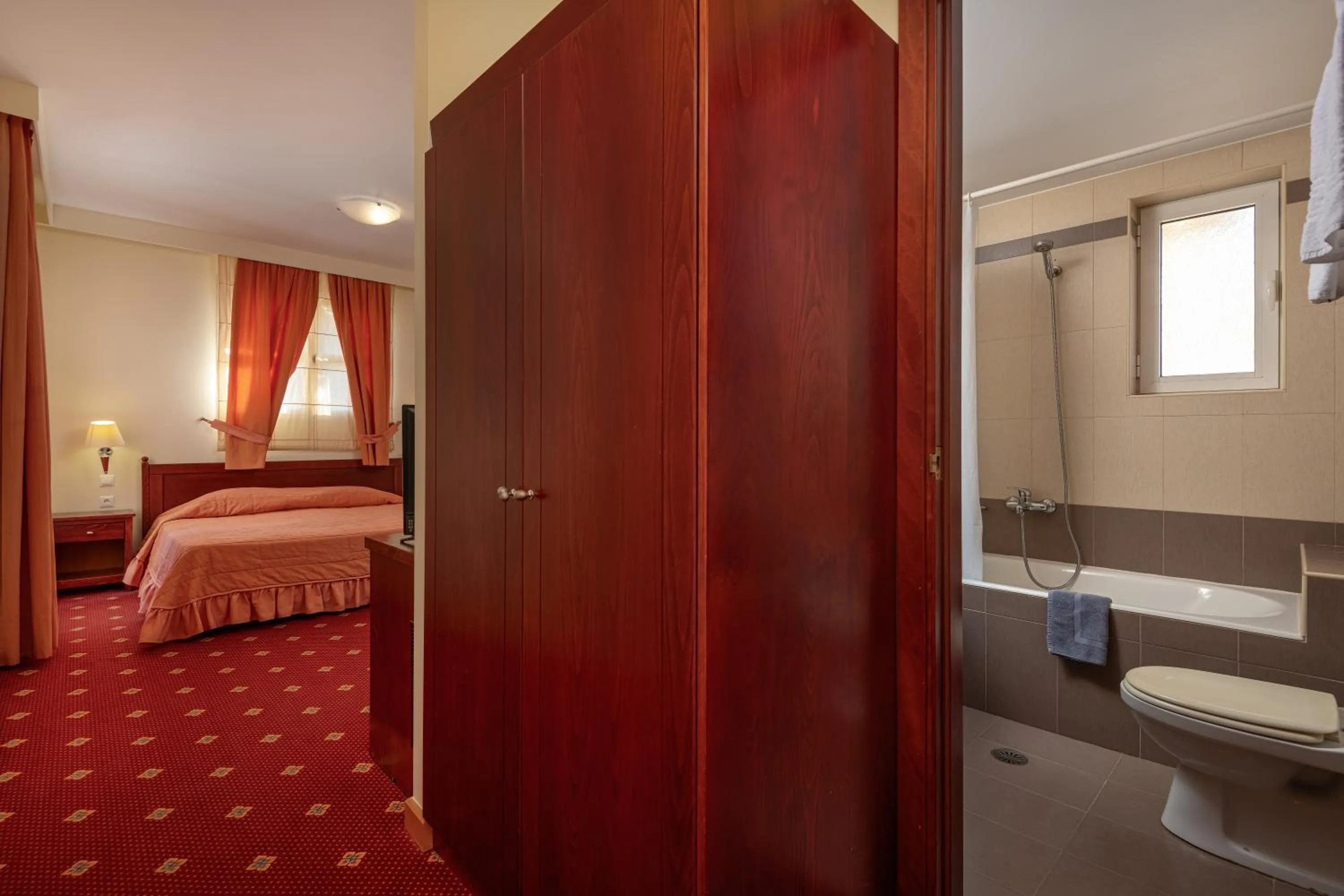 Bed in Crithoni's Paradise Hotel