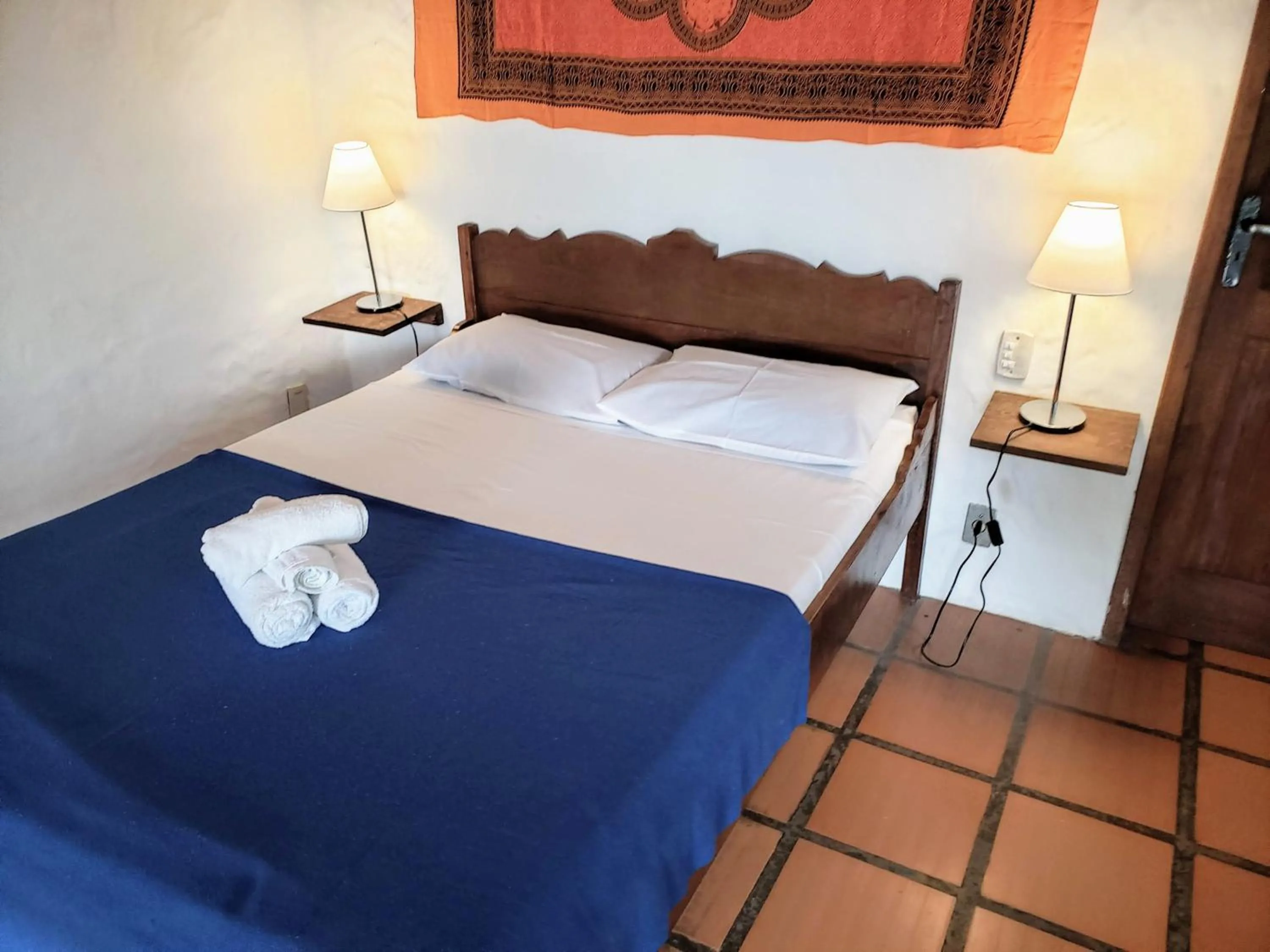 Bed in Pousada da Lagoinha