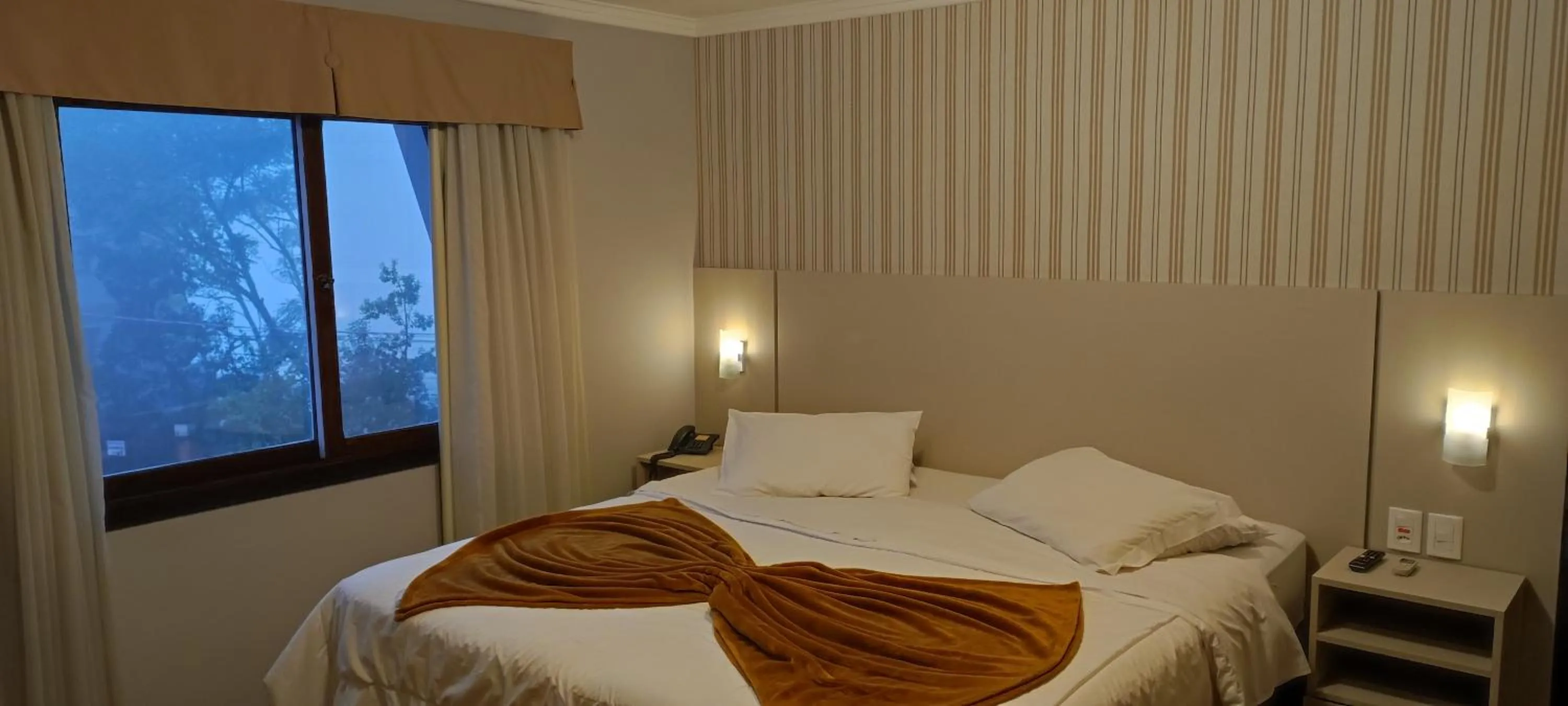 Bed in Pousada do Verde Gramado