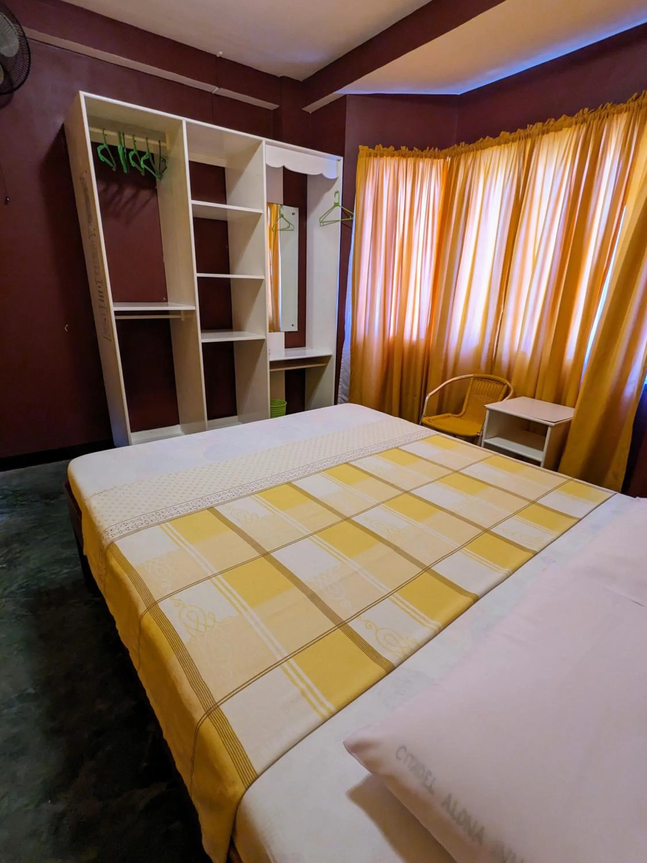 Bed in Citadel Alona Inn