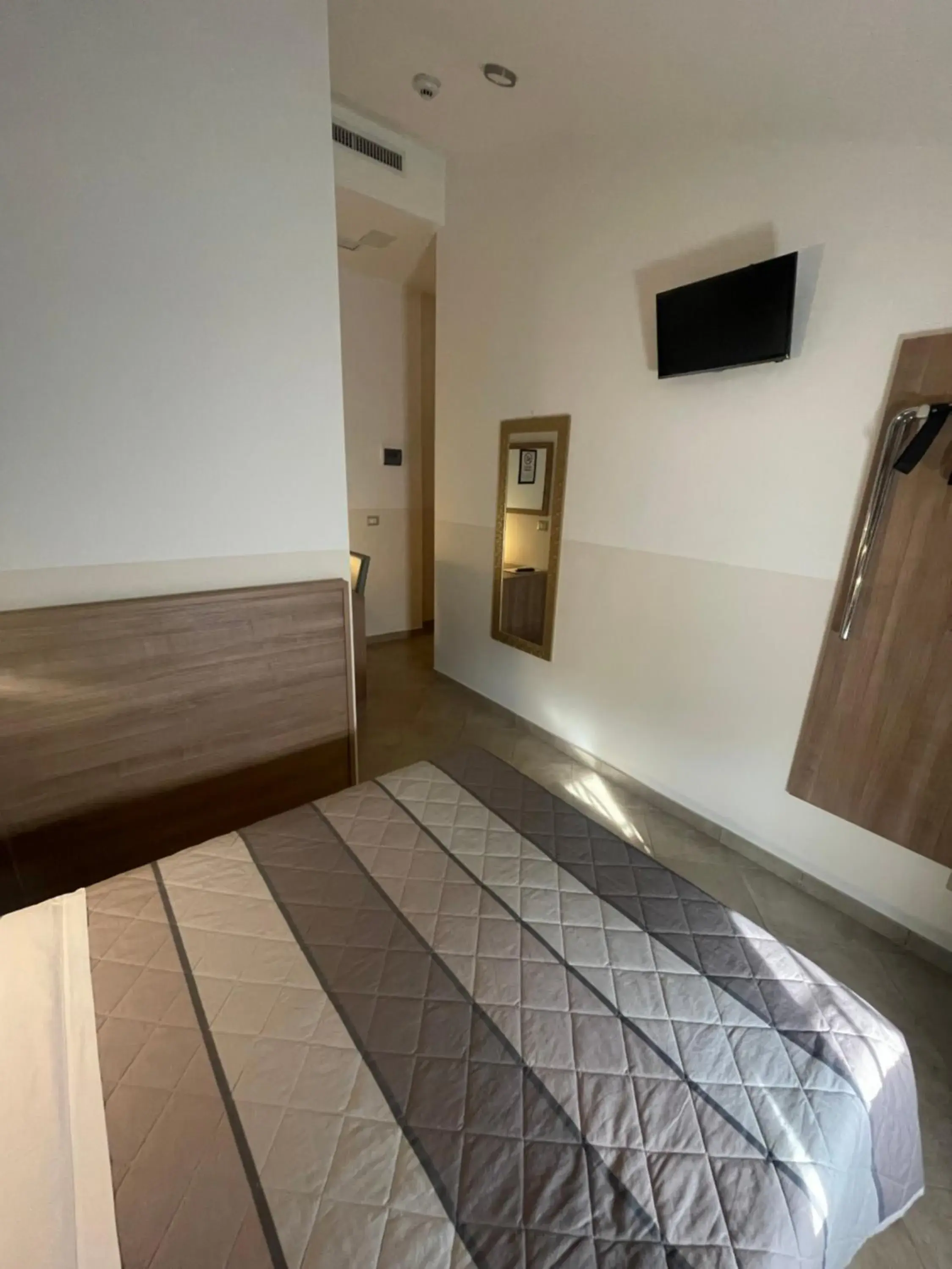 Bed in Hotel Montecarlo Bed in Hotel Montecarlo