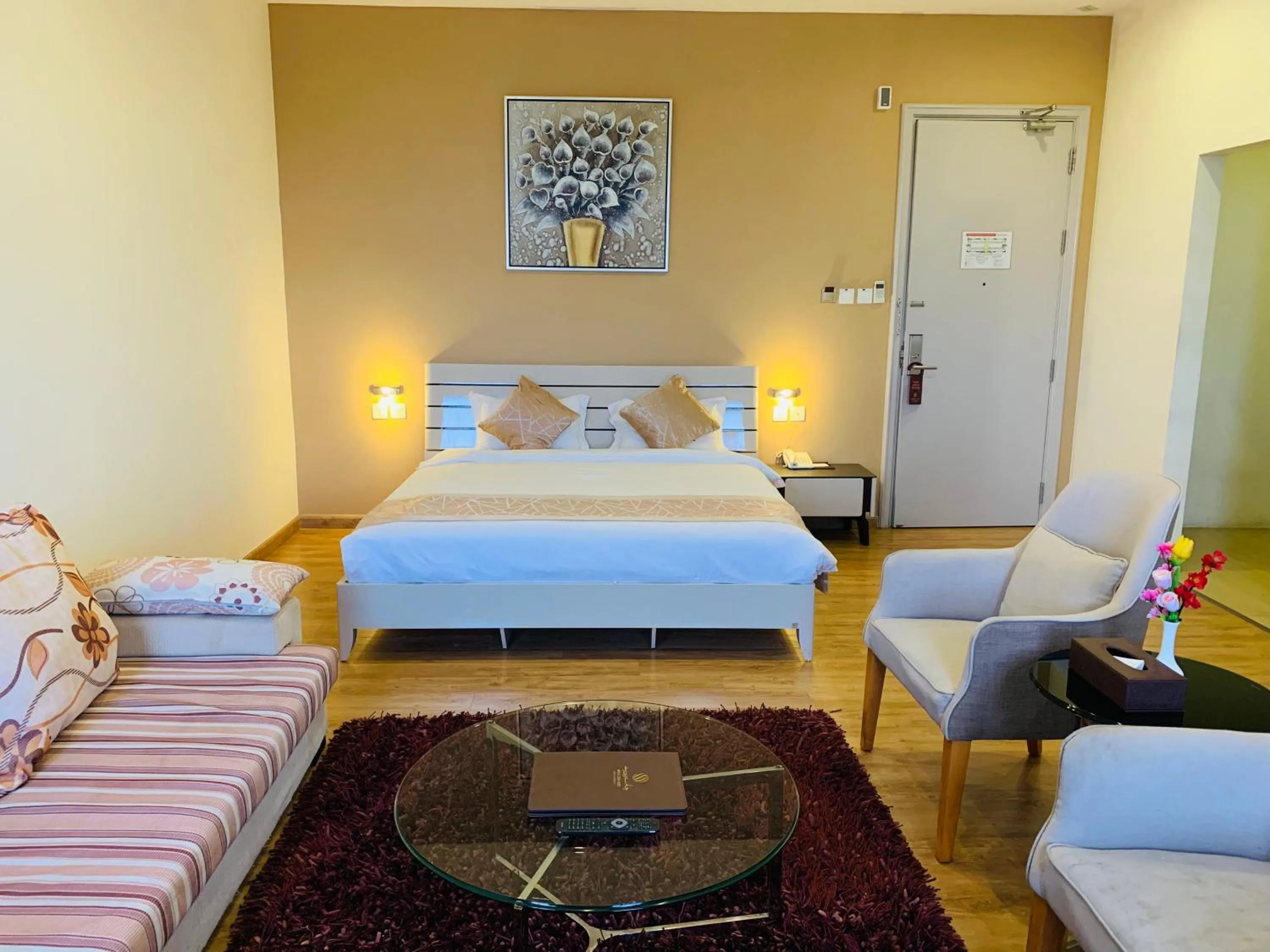 Seating area, Bed in Wafa Hotel & Apartment