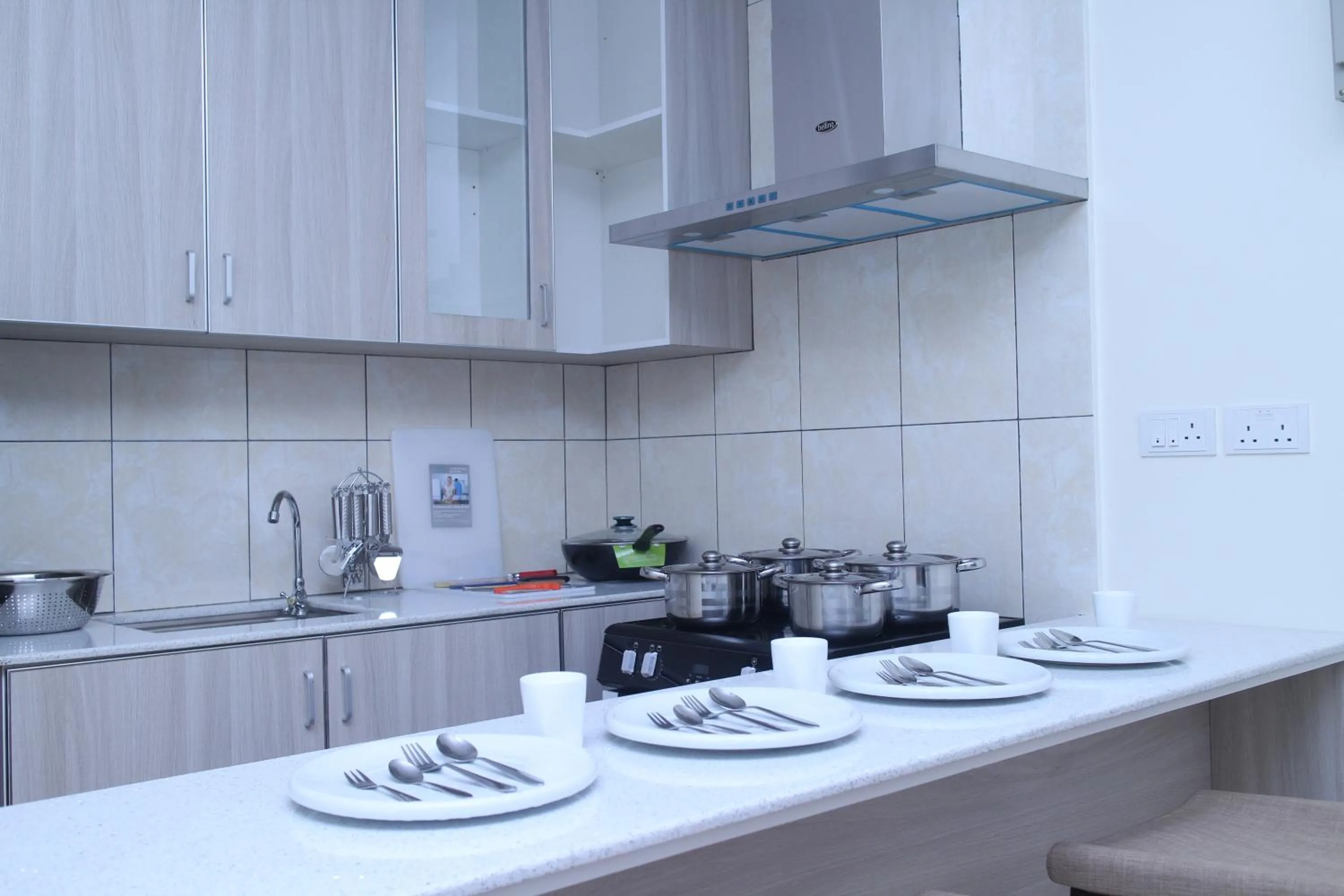 Kitchen or kitchenette in Wafa Hotel & Apartment