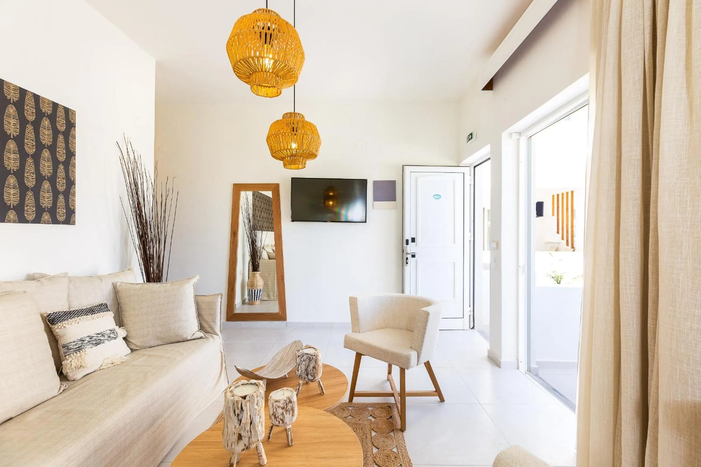 TV and multimedia in Nostos Beach Boutique Hotel