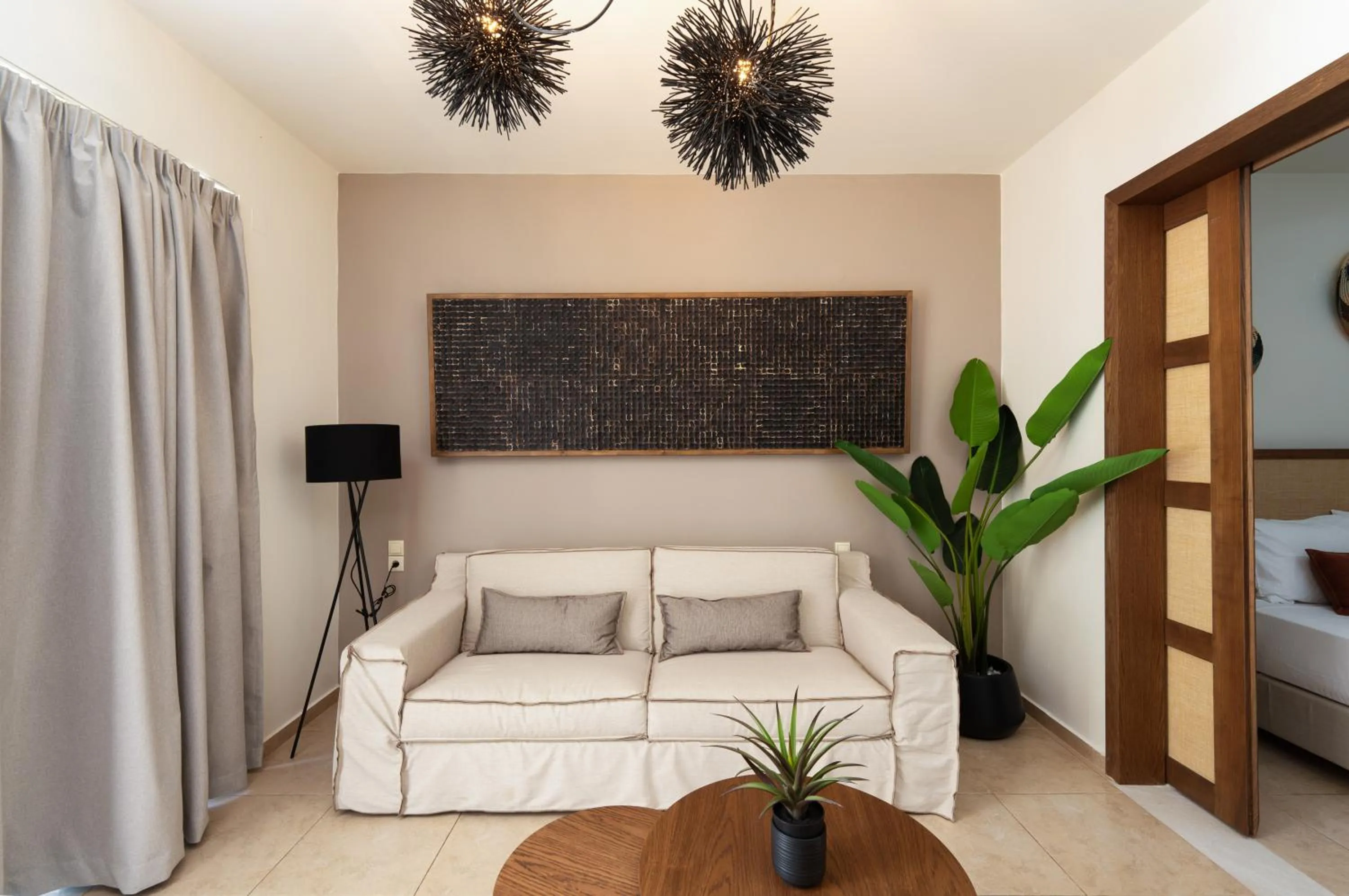 Living room in Nostos Beach Boutique Hotel