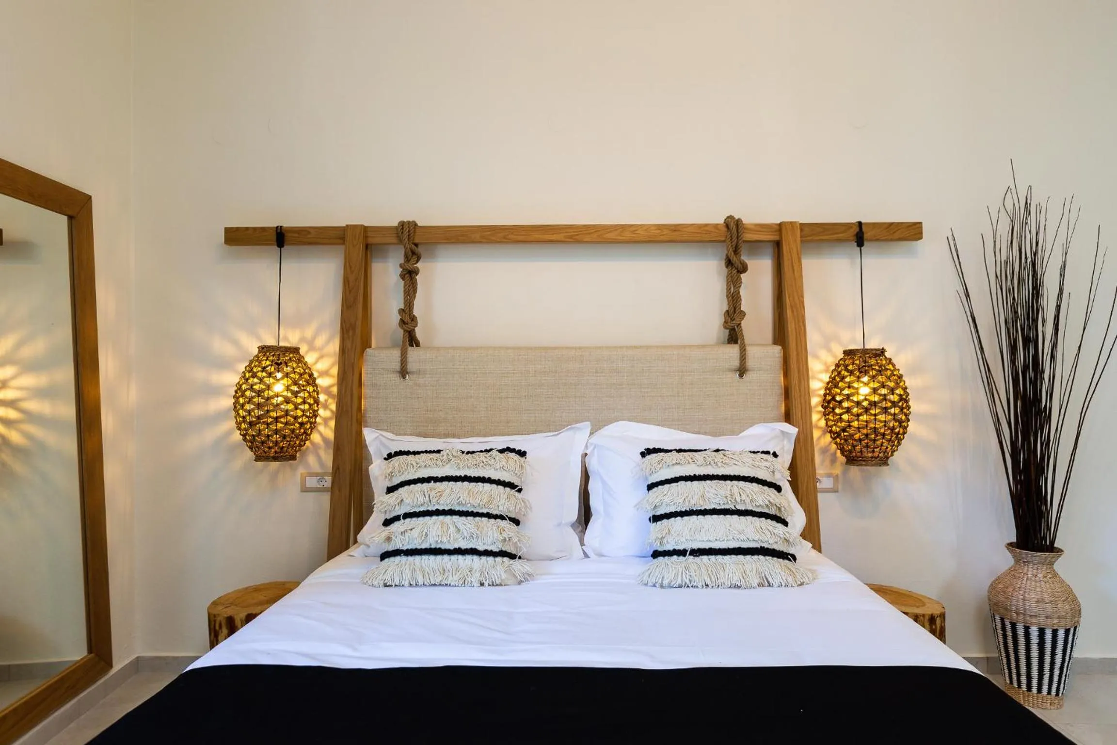 Bed in Nostos Beach Boutique Hotel