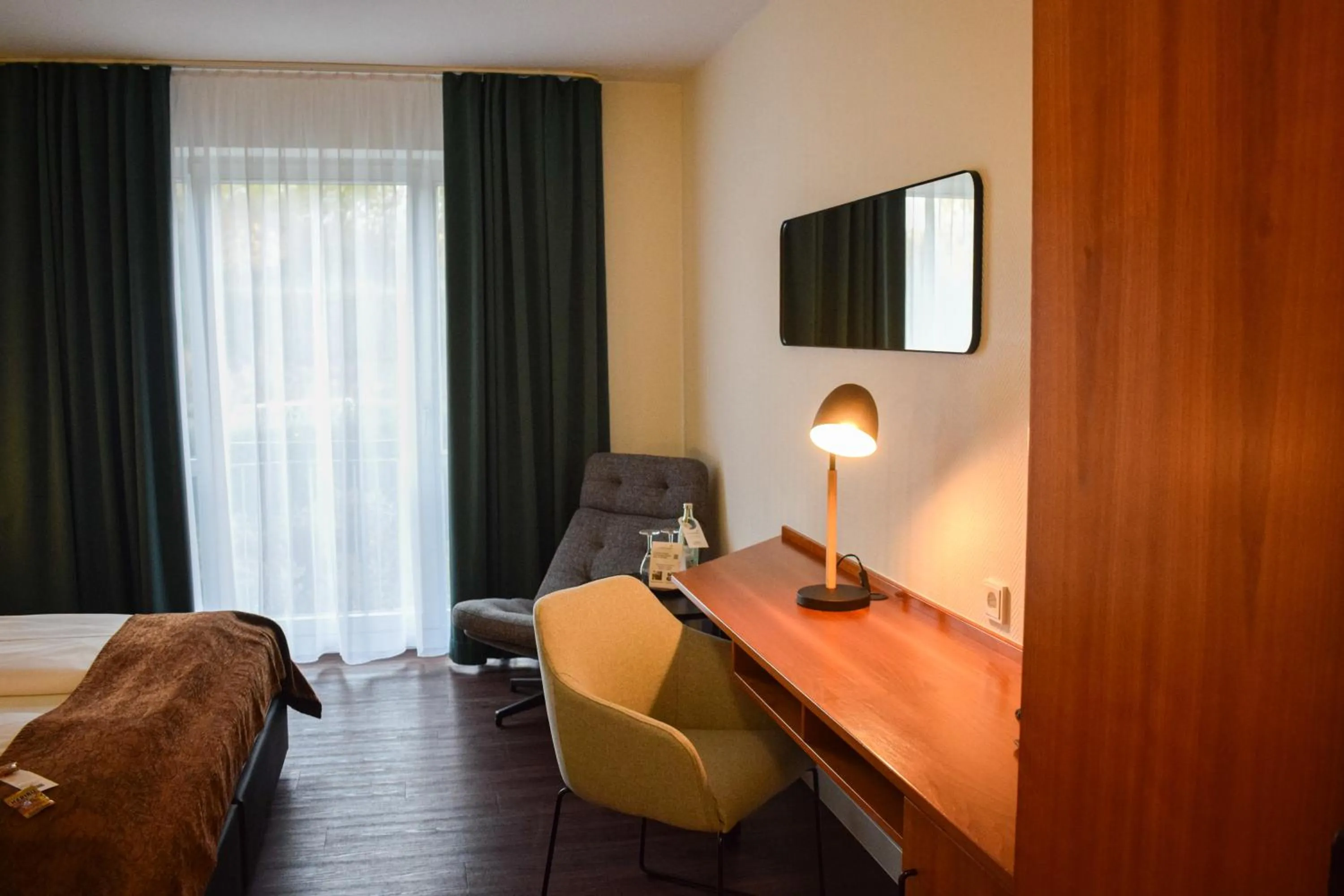 Photo of the whole room, Bed in Landhotel Rügheim