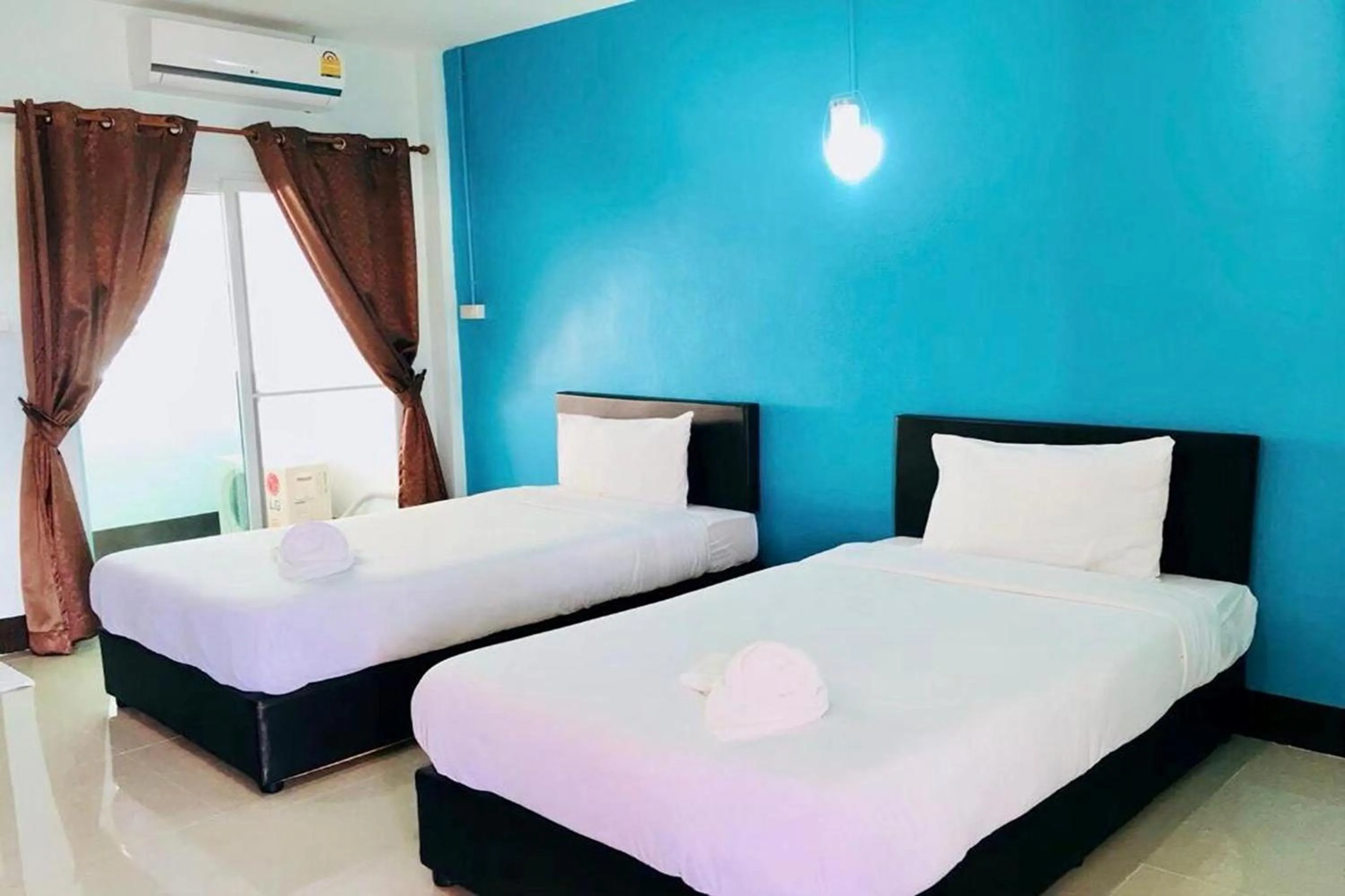 Bed in Chat House Chiang Rai