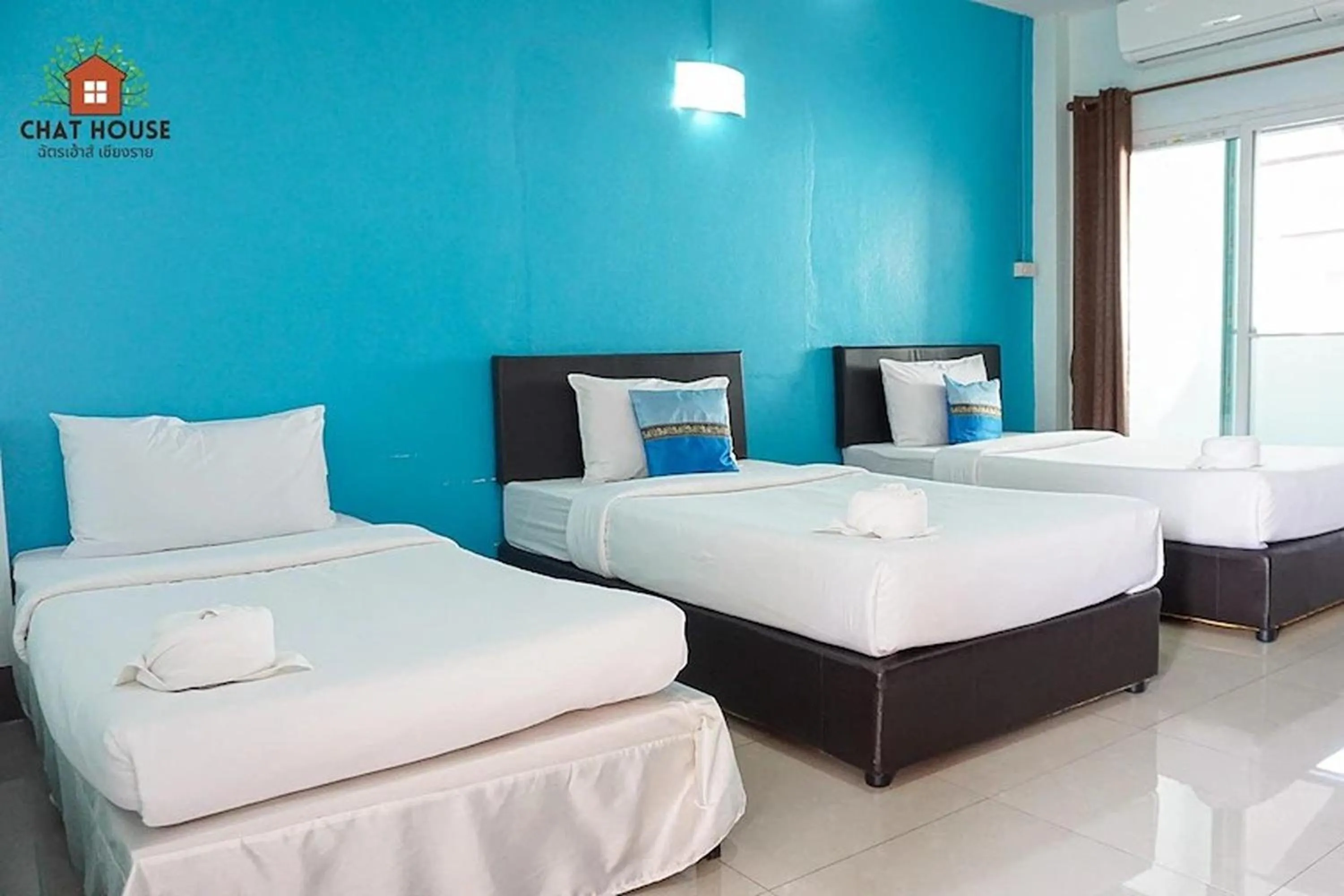 Bed in Chat House Chiang Rai