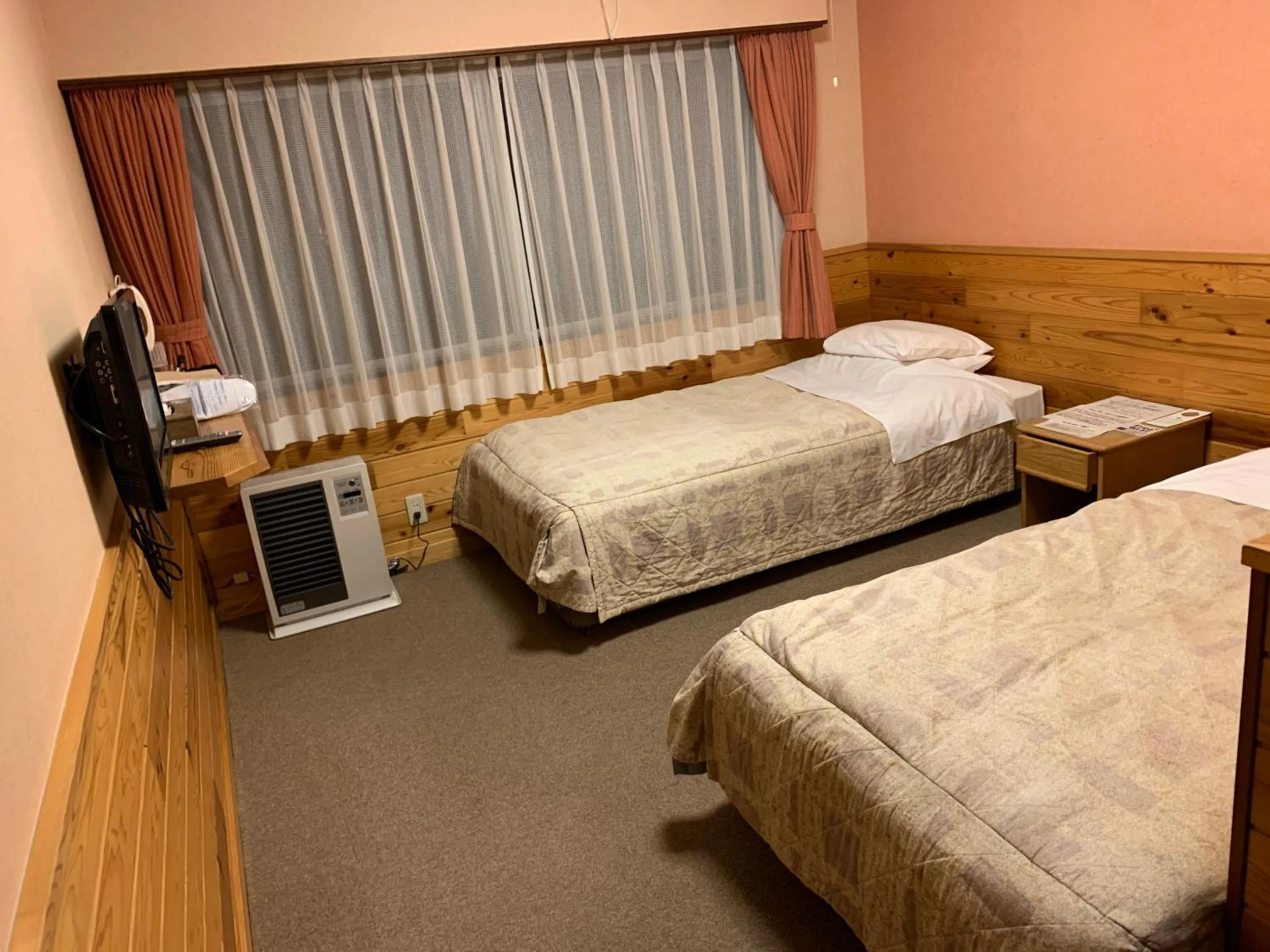 Bed in Turtle Inn Nikko