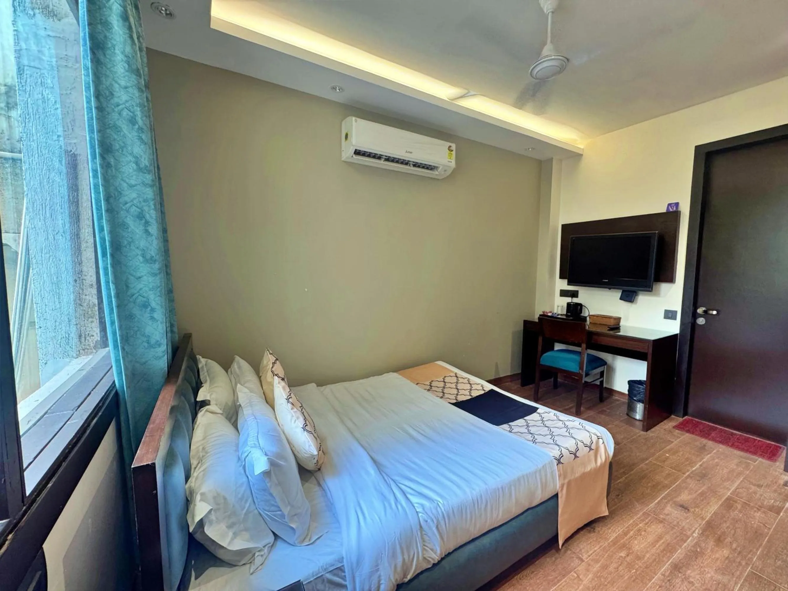 Bed in Amber Inn by Orion Hotels